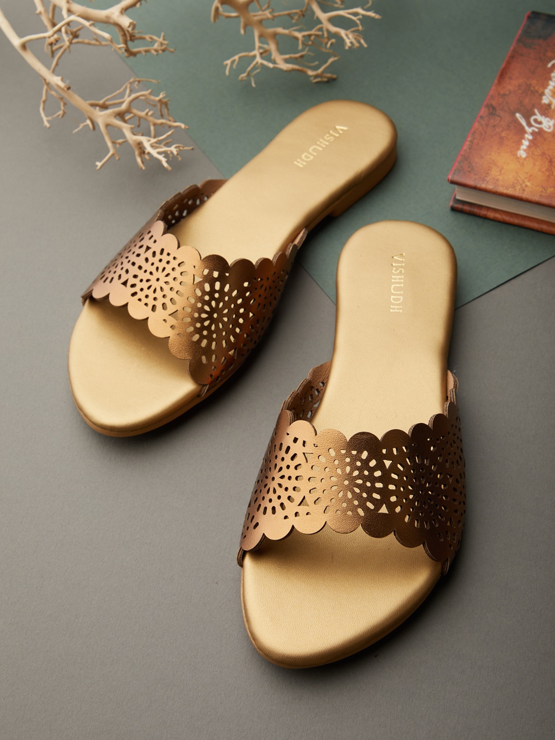 

Vishudh Women Bronze-Toned Textured Ethnic Open Toe Flats with Laser Cuts