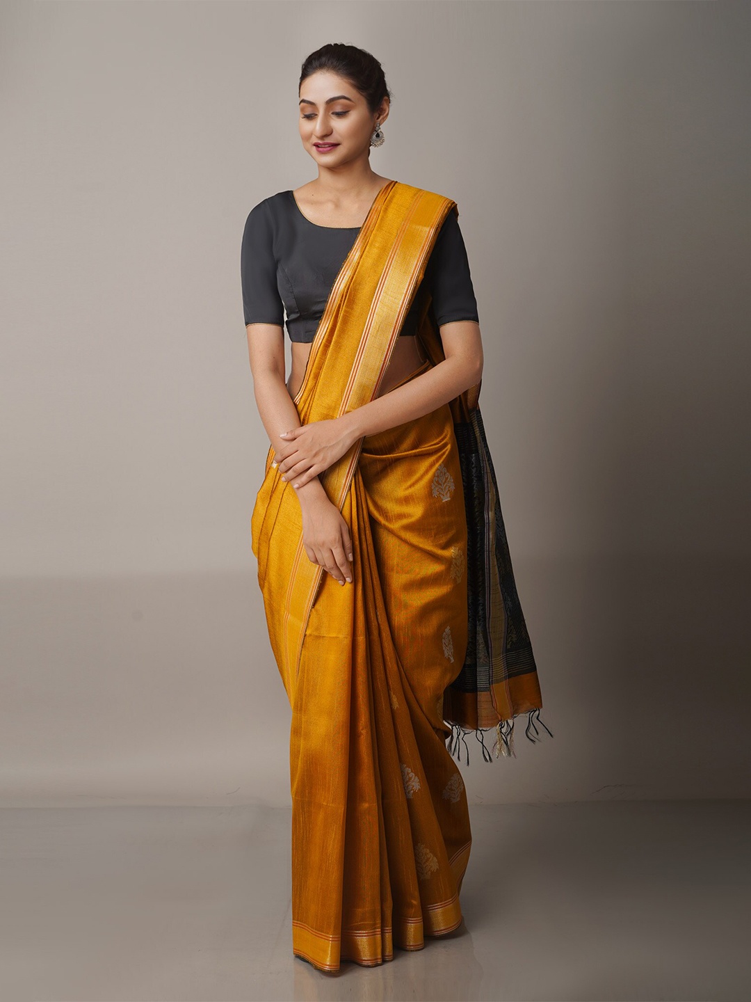 

Unnati Silks Mustard & Black Woven Design Zari Silk Blend Jamdani Saree