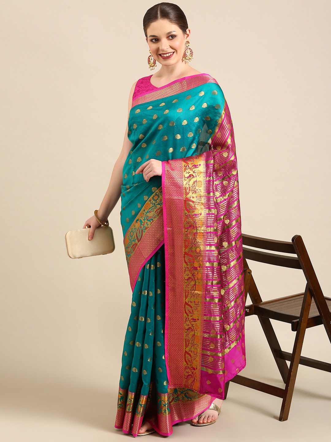 

Anouk Sea Green & Gold-Toned Ethnic Motifs Zari Silk Blend Kanjeevaram Saree