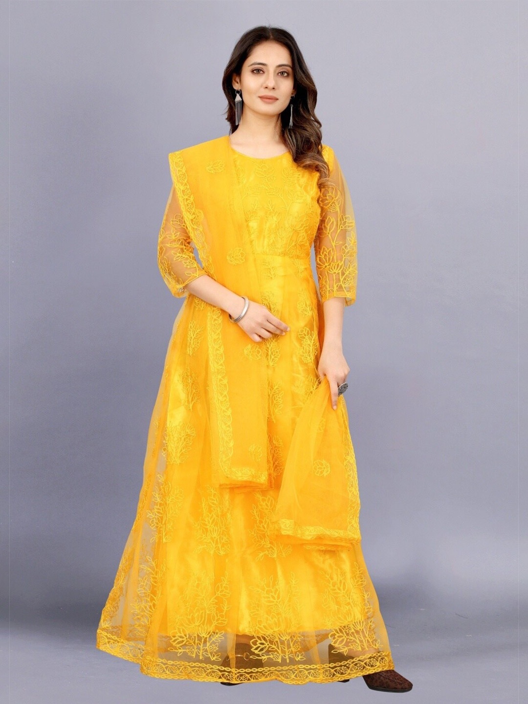 

APNISHA Women Yellow Floral Embroidered Net Ethnic Maxi Dress With Dupatta