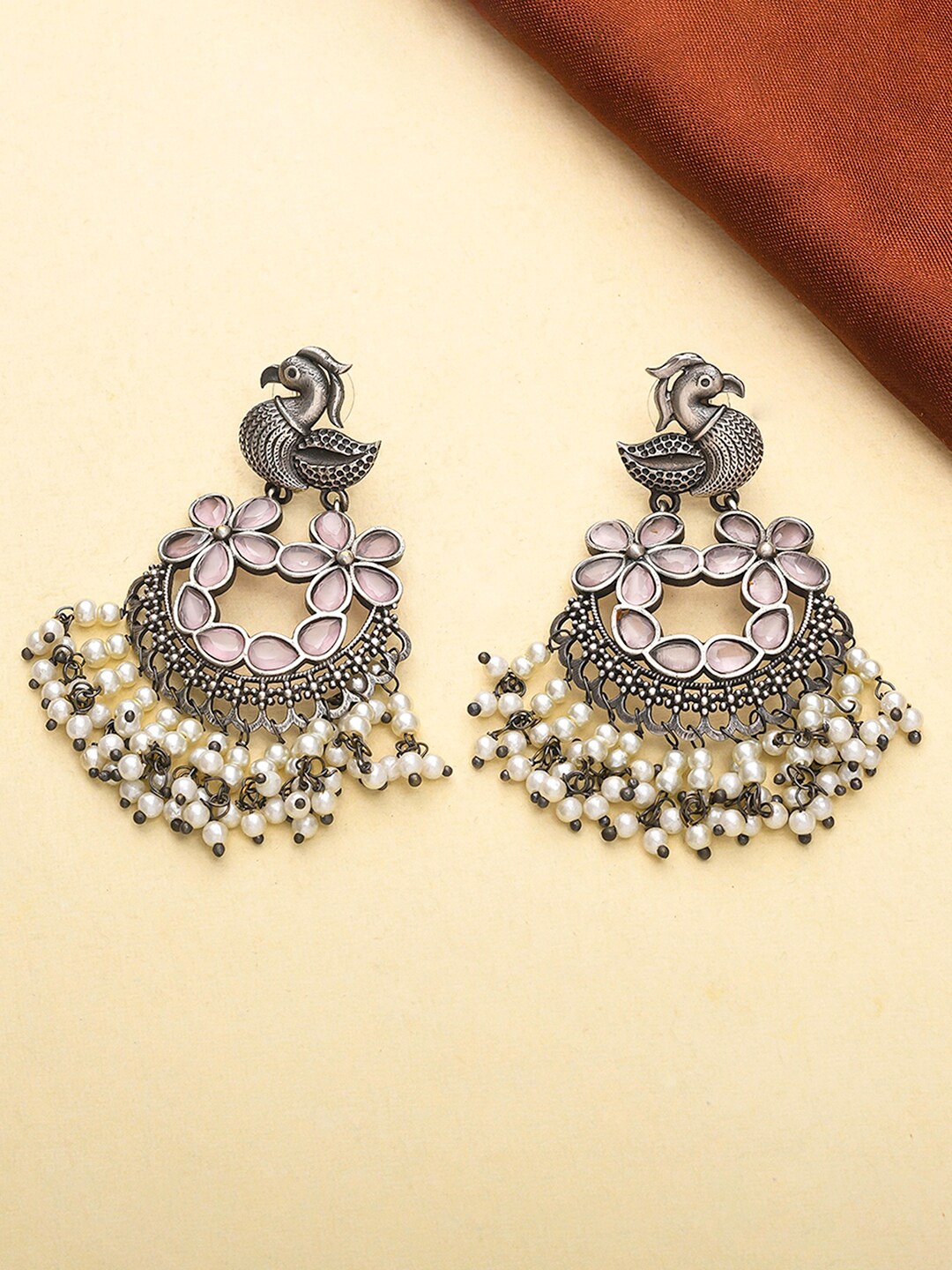 

Voylla Silver-Plated & Purple Peacock Shaped Chandbalis Earrings