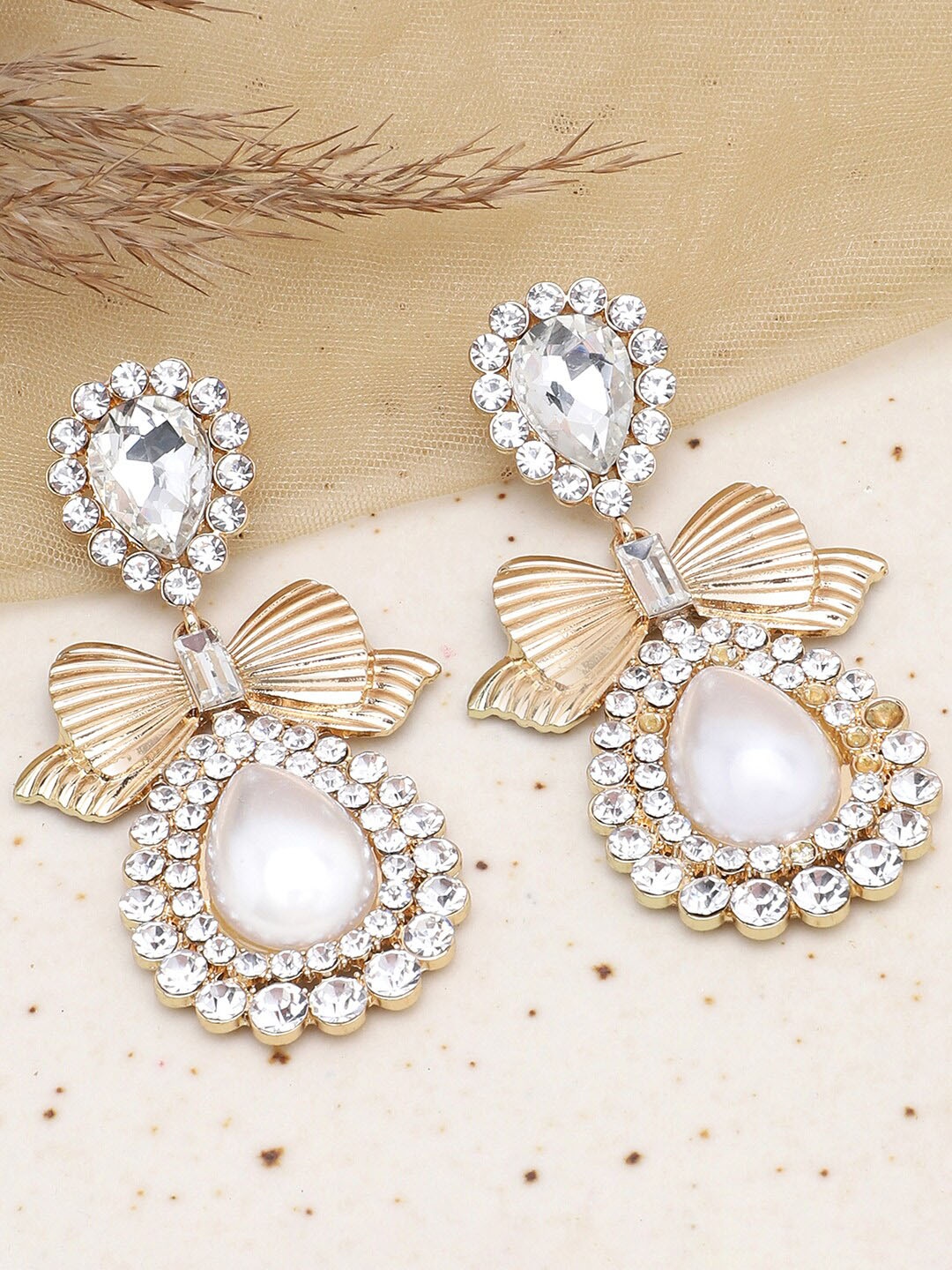 

SOHI Women Gold-Toned & White Contemporary Drop Earrings