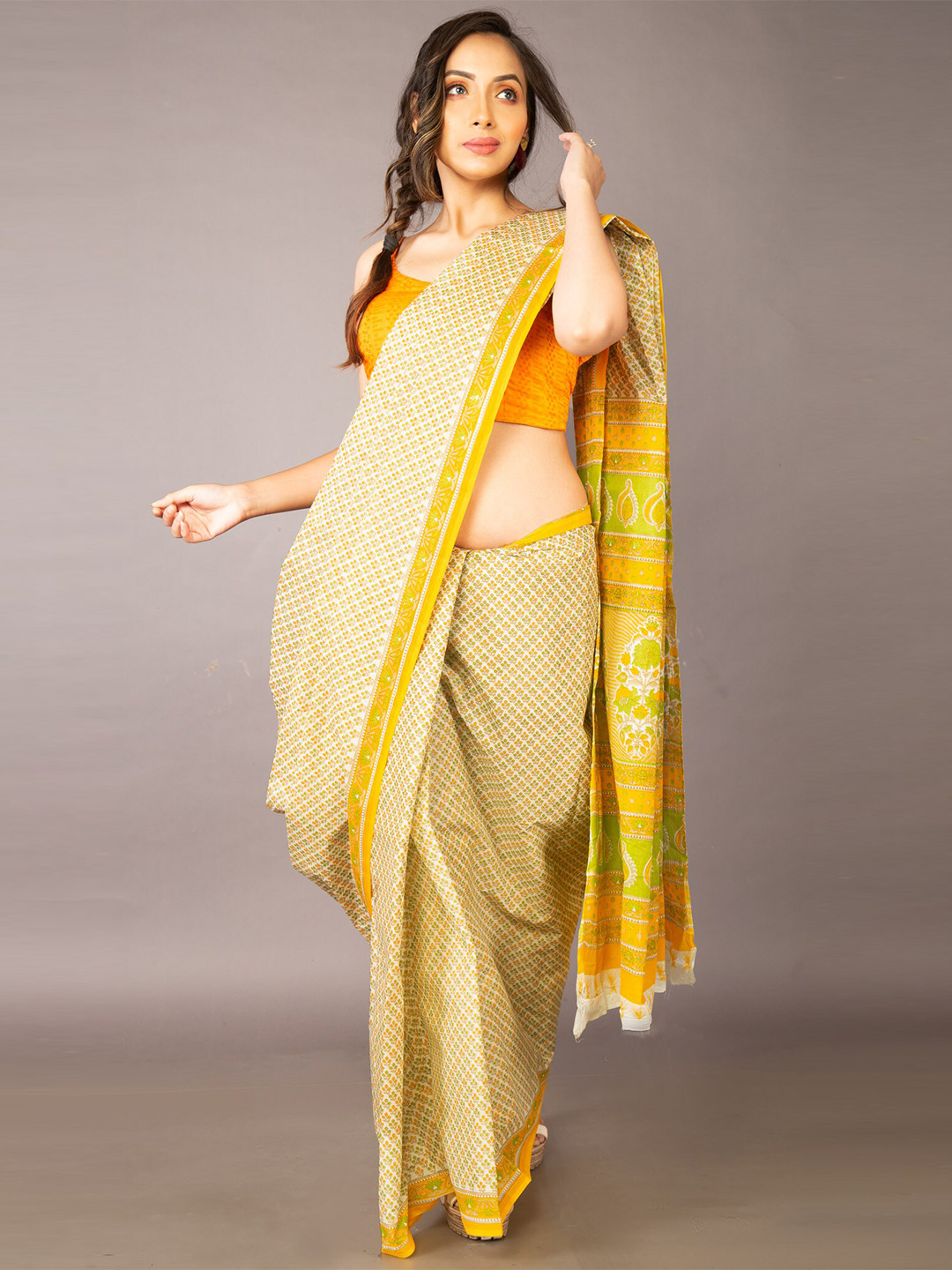 

Unnati Silks White & Yellow Ethnic Motifs Pure Cotton Kovai Saree