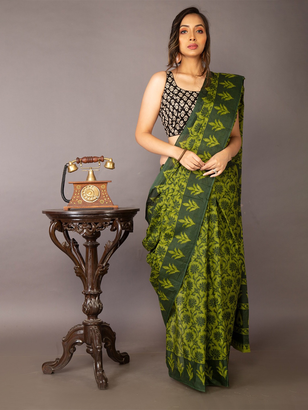 

Unnati Silks Green & Black Floral Pure Cotton Kovai Saree