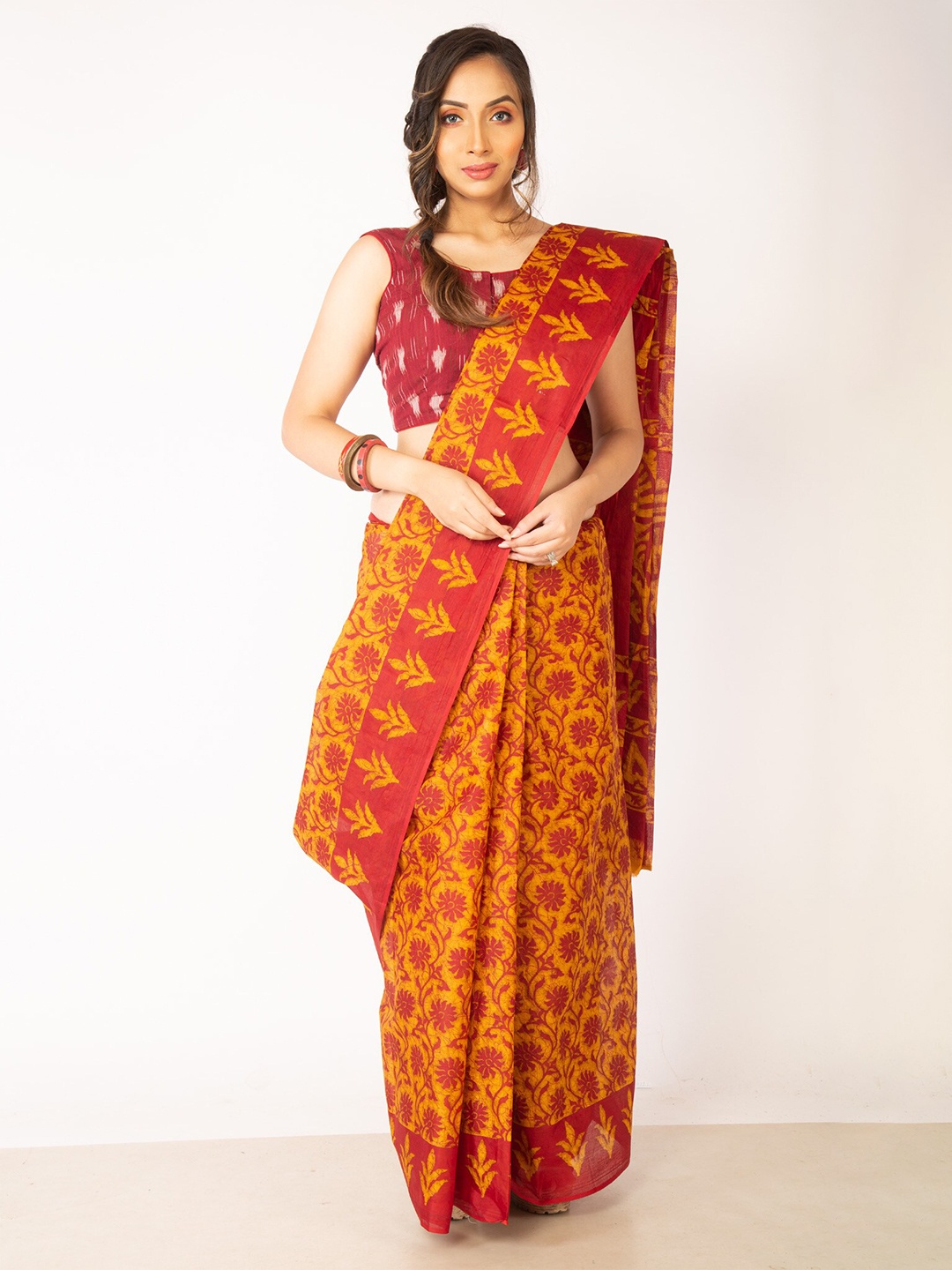 

Unnati Silks Orange & Pink Ethnic Motifs Pure Cotton Kovai Saree