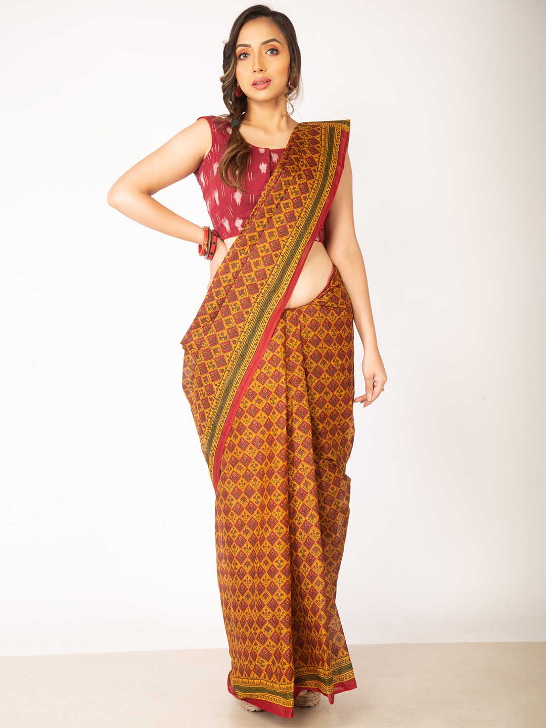 

Unnati Silks Yellow & Red Ethnic Motifs Pure Cotton Kovai Saree