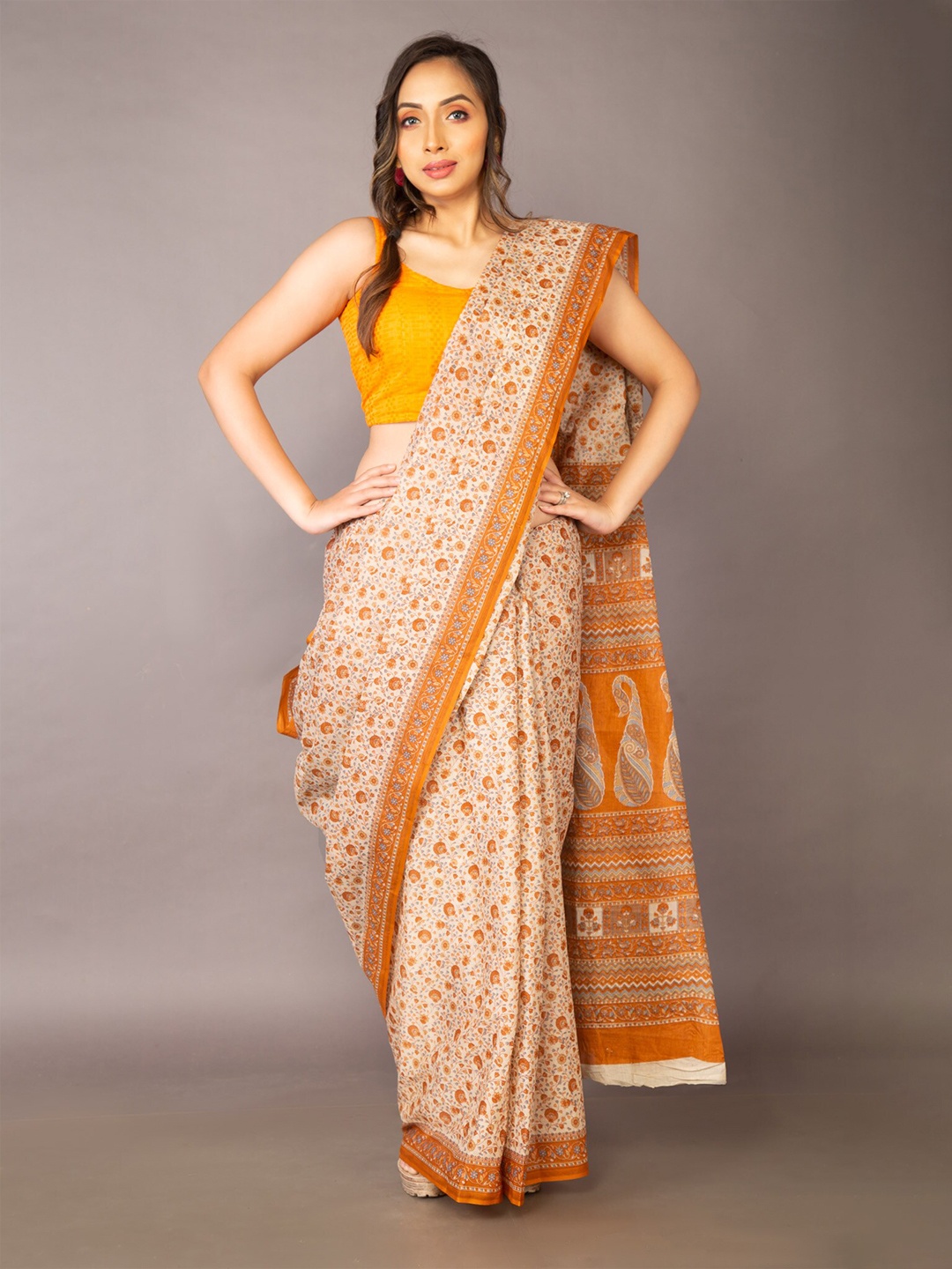 

Unnati Silks White & Orange Floral Printed Pure Cotton Kovai Saree