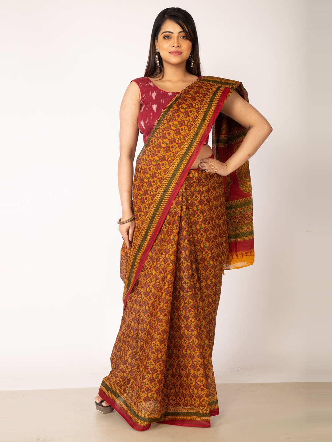 

Unnati Silks Red & Yellow Ethnic Motifs Pure Cotton Kovai Saree