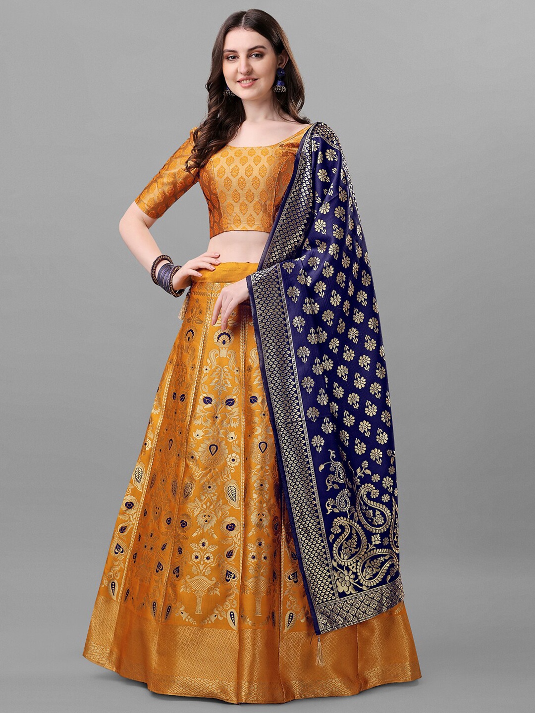

Ethnic Yard Yellow & Blue Semi-Stitched Lehenga & Unstitched Blouse With Dupatta