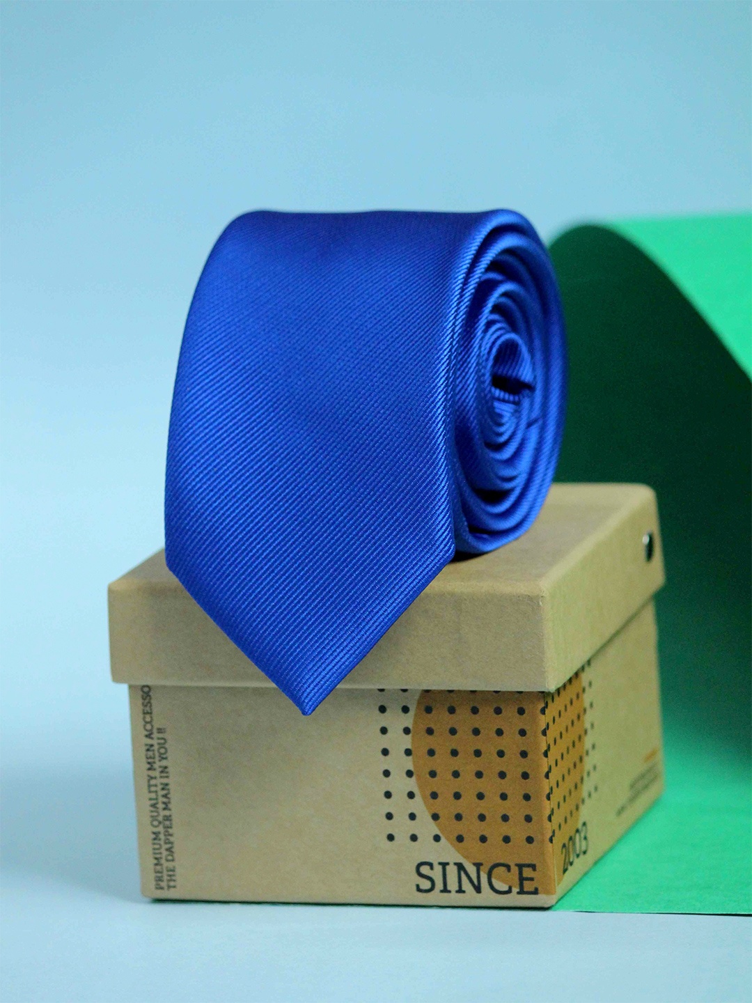 

Tossido Men Blue Solid Skinny Tie