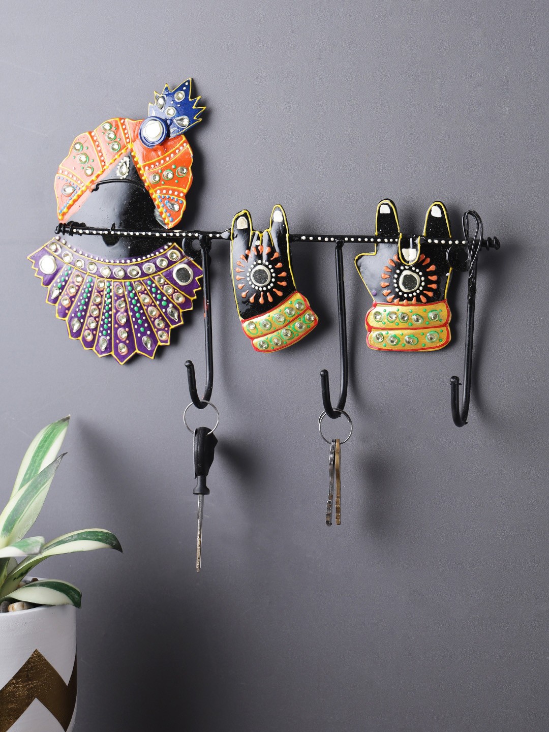 

Aapno Rajasthan Black & Orange Lord Krishna 3 Hooks Metal Key Holder