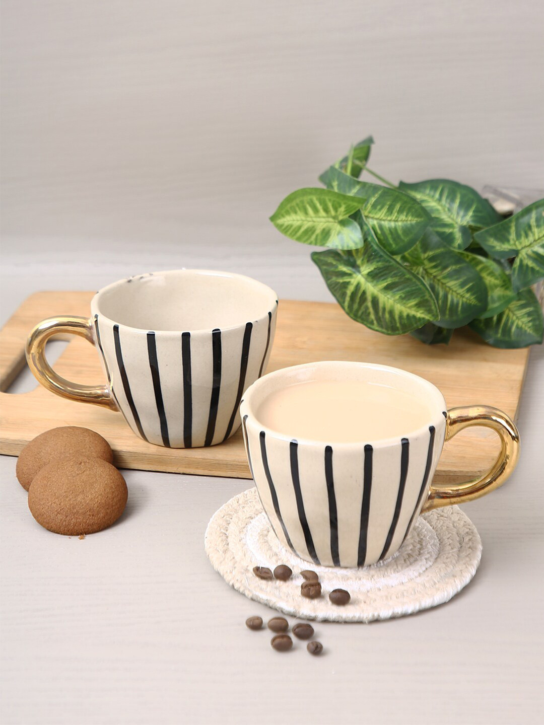 

Aapno Rajasthan White & Black Set Of 2 Printed Ceramic Glossy Mugs 250 ml Each