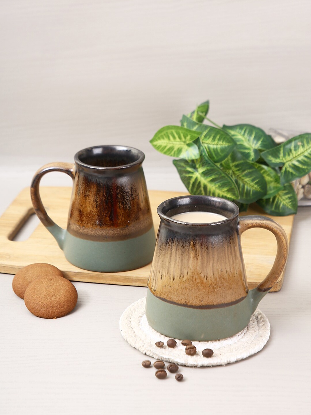 

Aapno Rajasthan Brown & Grey Set Of 4 Printed Ceramic Matte Mugs 250 ml Each