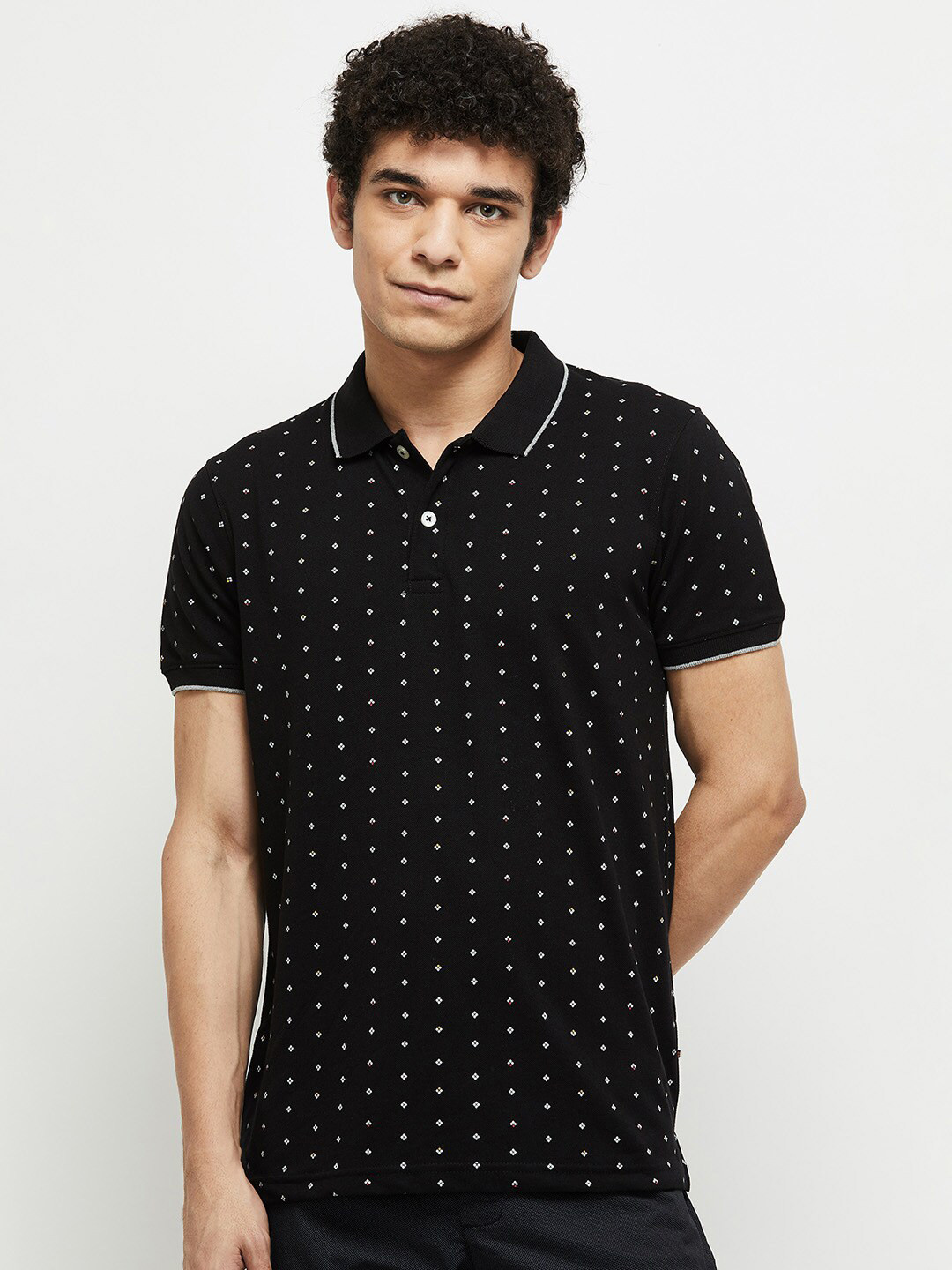 

max Men Black Printed Polo Collar Cotton T-shirt
