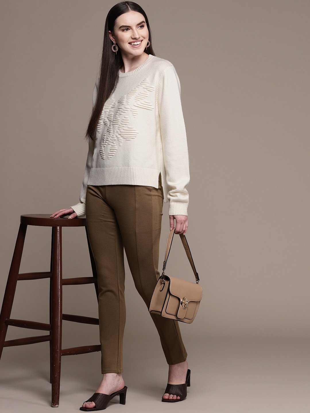

Label Ritu Kumar Women Off White Pullover Sweater