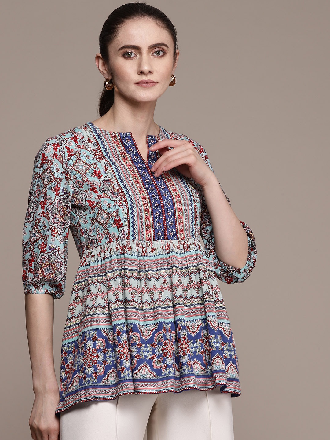 

Label Ritu Kumar Blue Floral Print Peplum Top