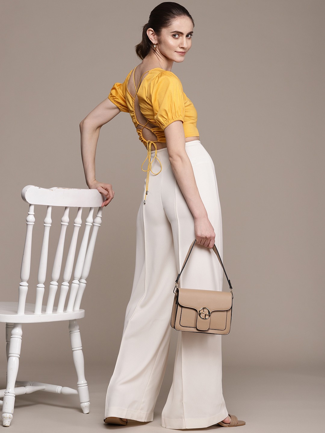 

Label Ritu Kumar Yellow Solid Crop Top