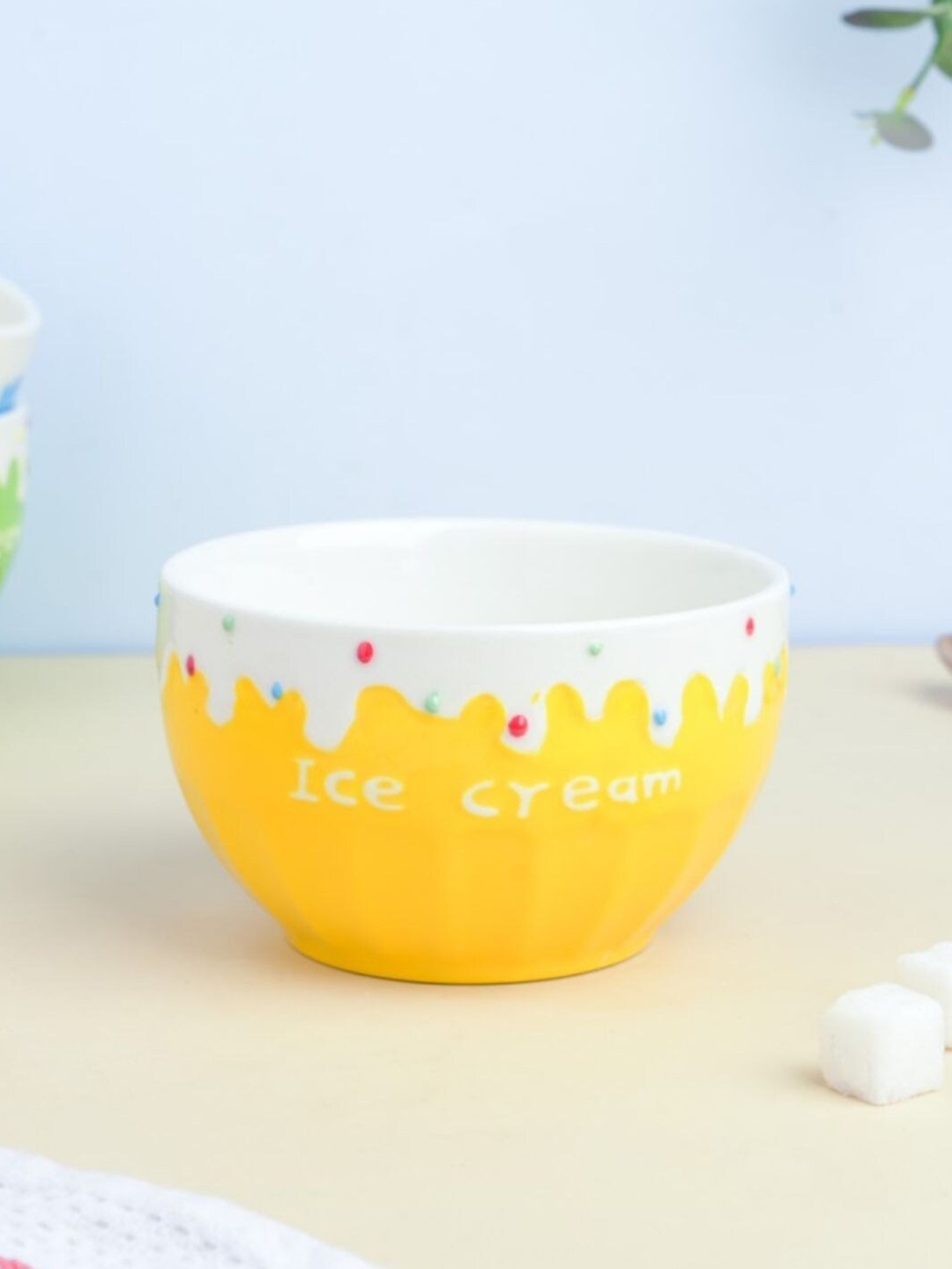

Nestasia White & Yellow Printed Microwave safe Ceramic Glossy Bowl