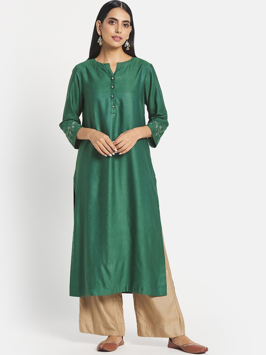 

Fabindia Women Green Solid Straight Kurta