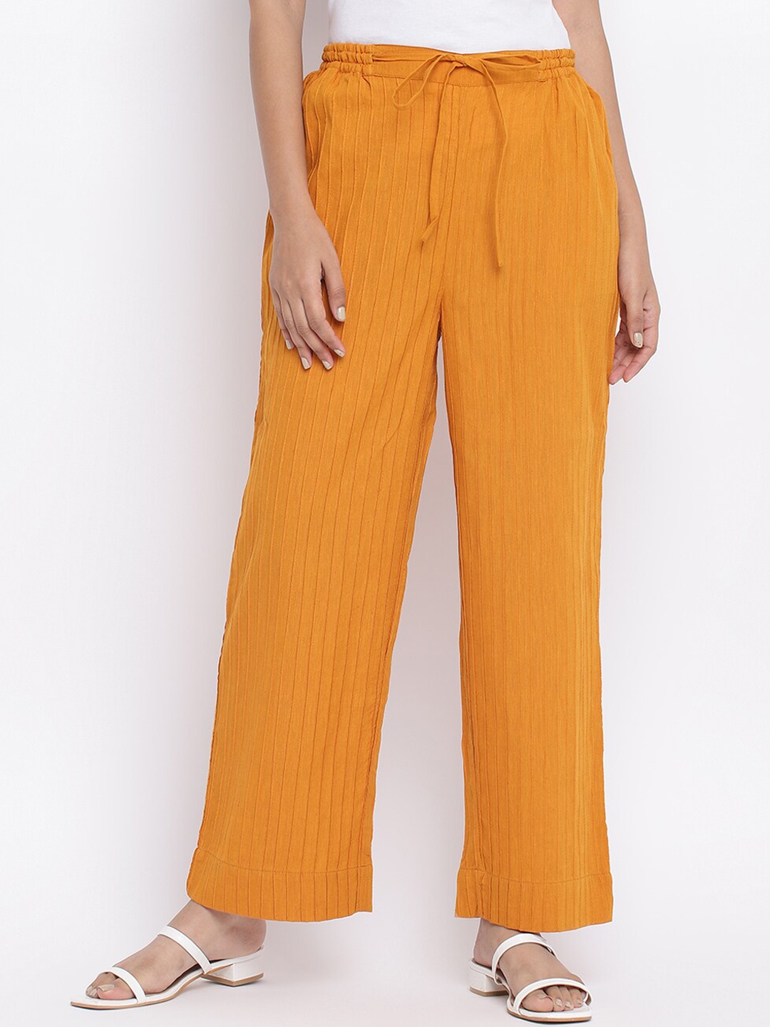 

Fabindia Women Mustard Yellow Solid Easy Wash Trousers