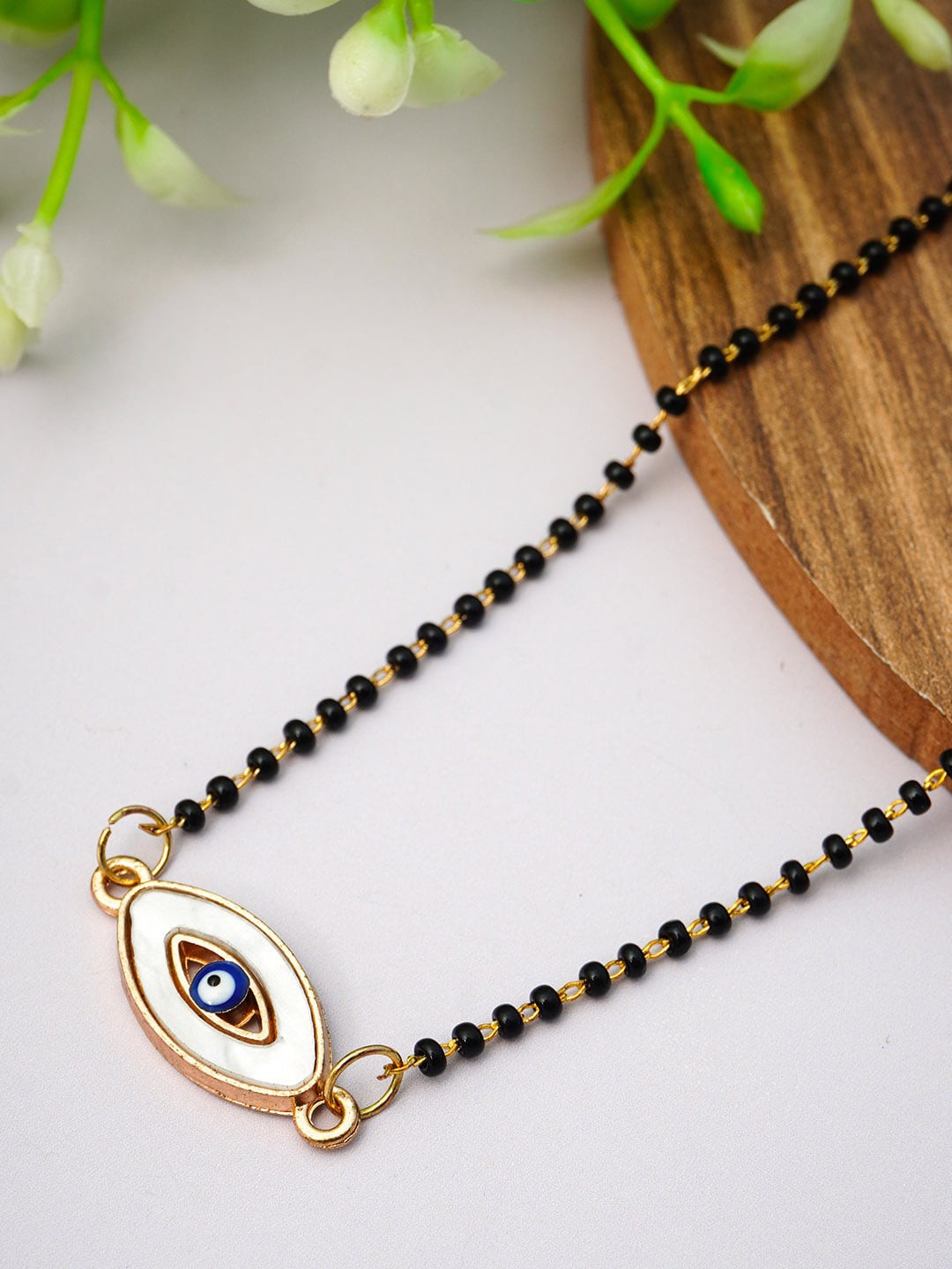 

Ferosh White & Black Beaded Evil Eye Pendant Chain