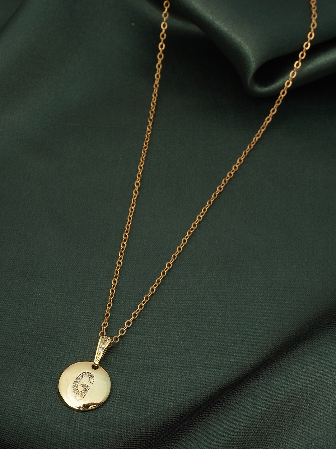 

Ferosh Gold-Toned & White Crystals Studded G Gold Coin Pendant With Chain