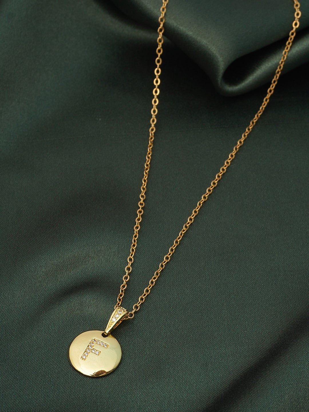 

Ferosh Gold-Toned Stone-Studded Alphabet F Gold Coin Pendant With Chain