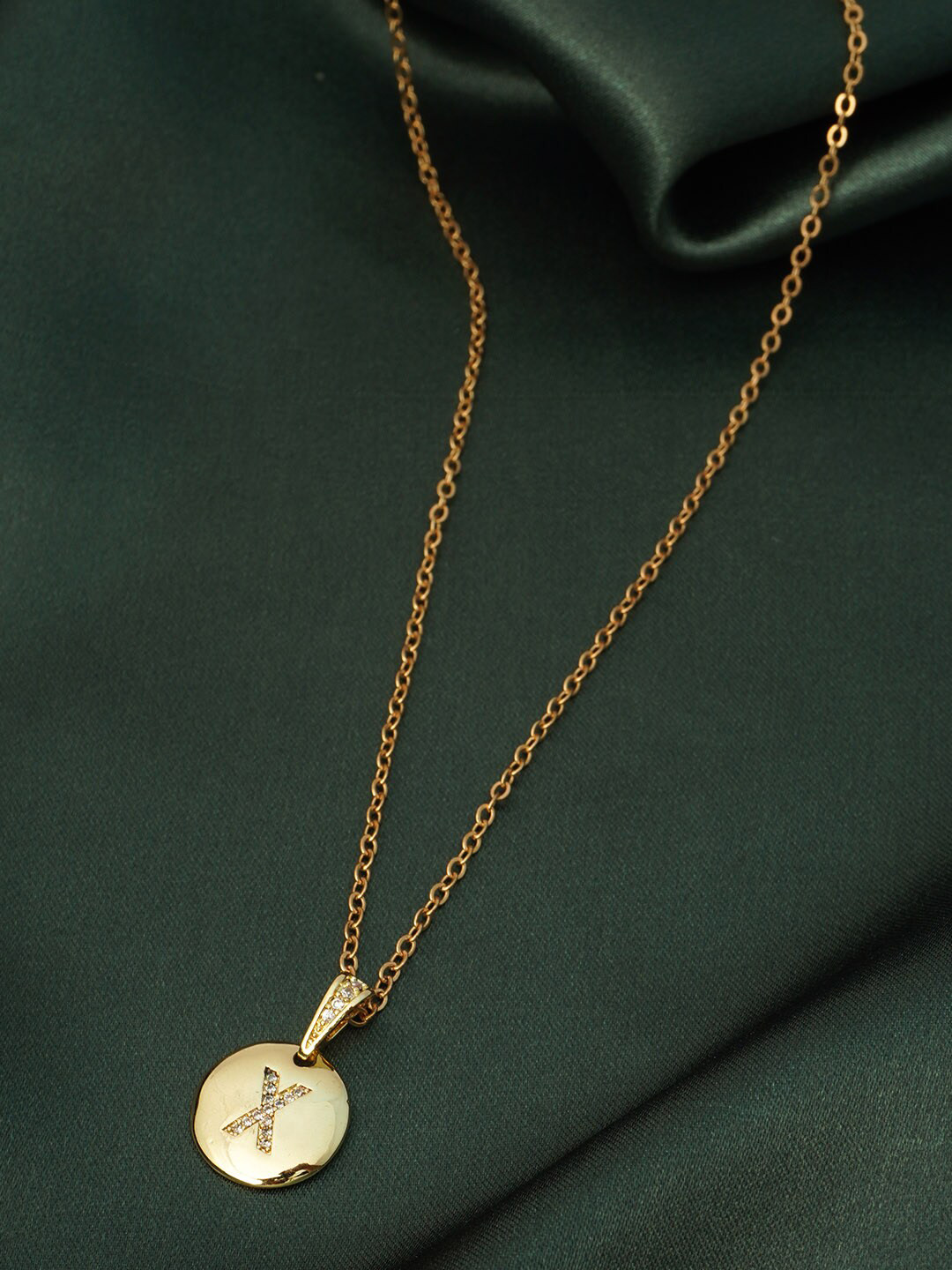 

Ferosh Women Gold-Toned Crystal Studded & Alphabet X Coin Pendant