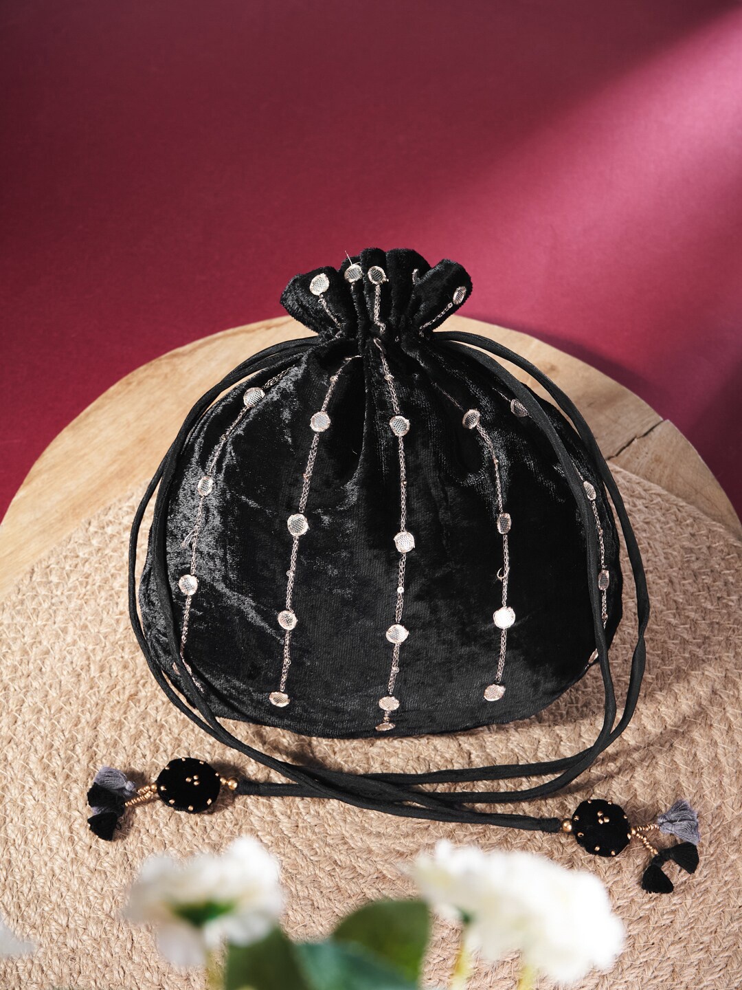 

Fabindia Black Embellished Embellished Potli Clutch