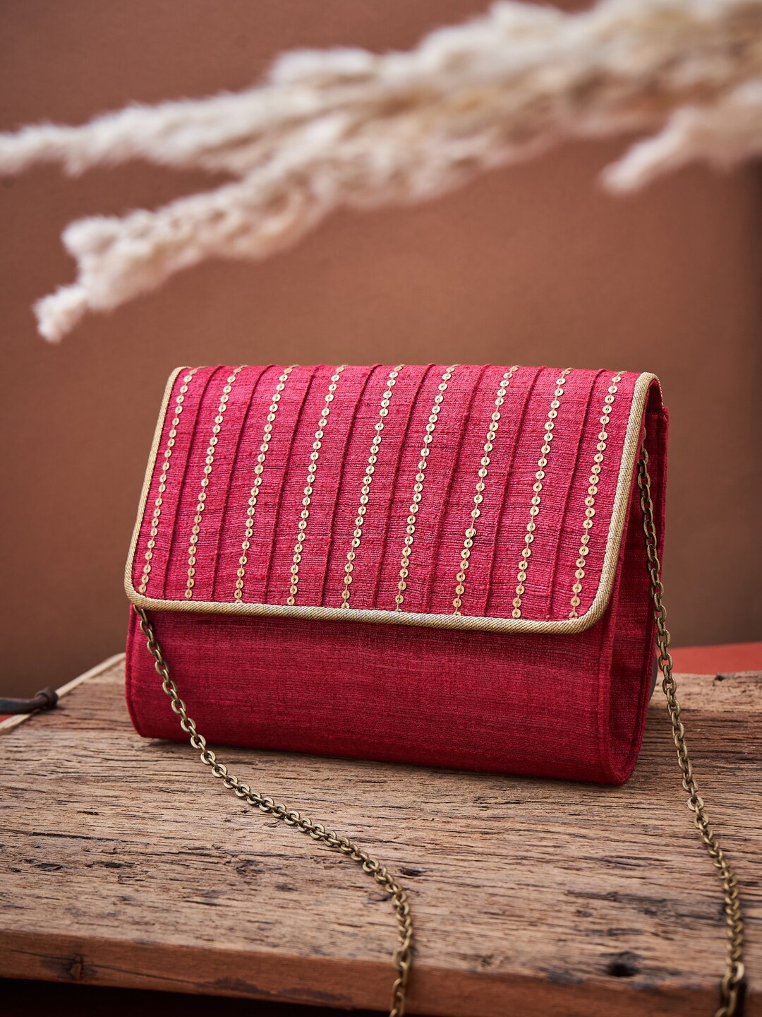 

Fabindia Women Red & Gold-Toned Embellished Clutch