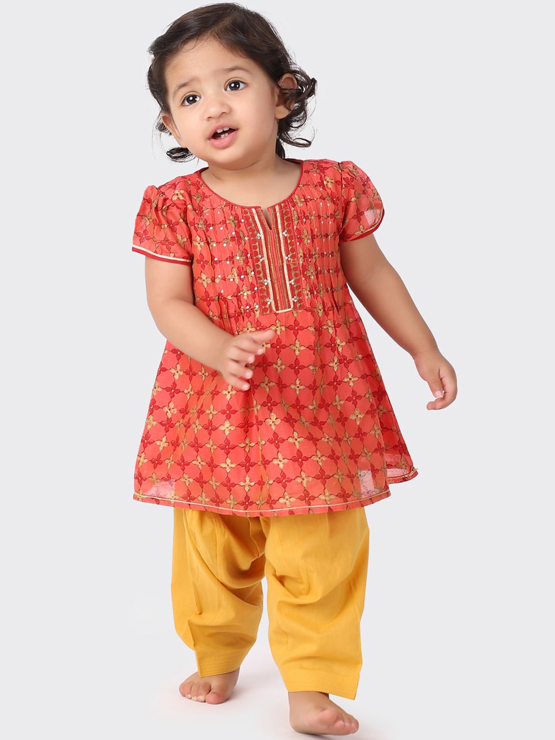 

Fabindia Girls Red Floral Printed Kurta with Salwar