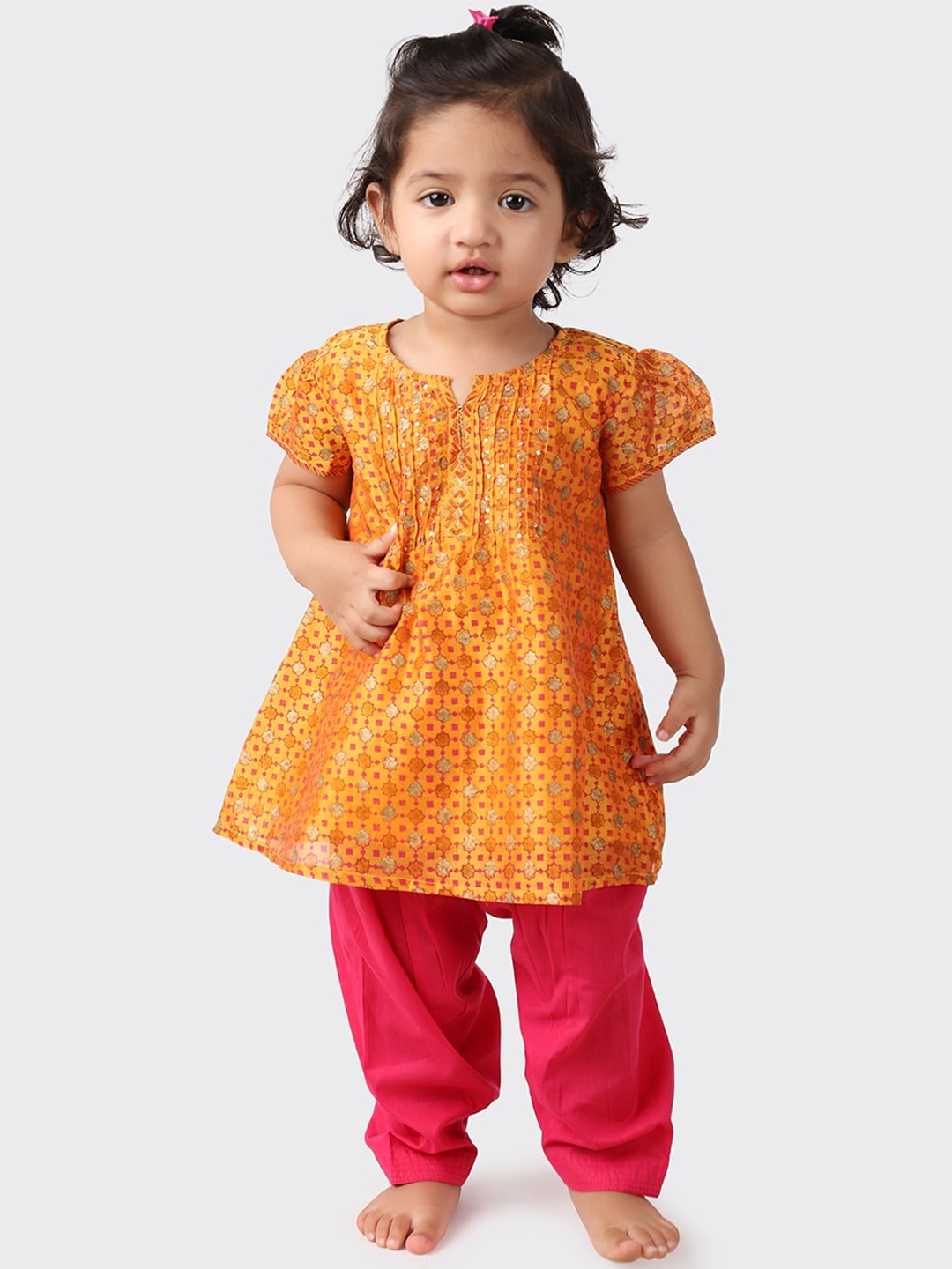 

Fabindia Girls Yellow Floral Printed Kurta with Trousers