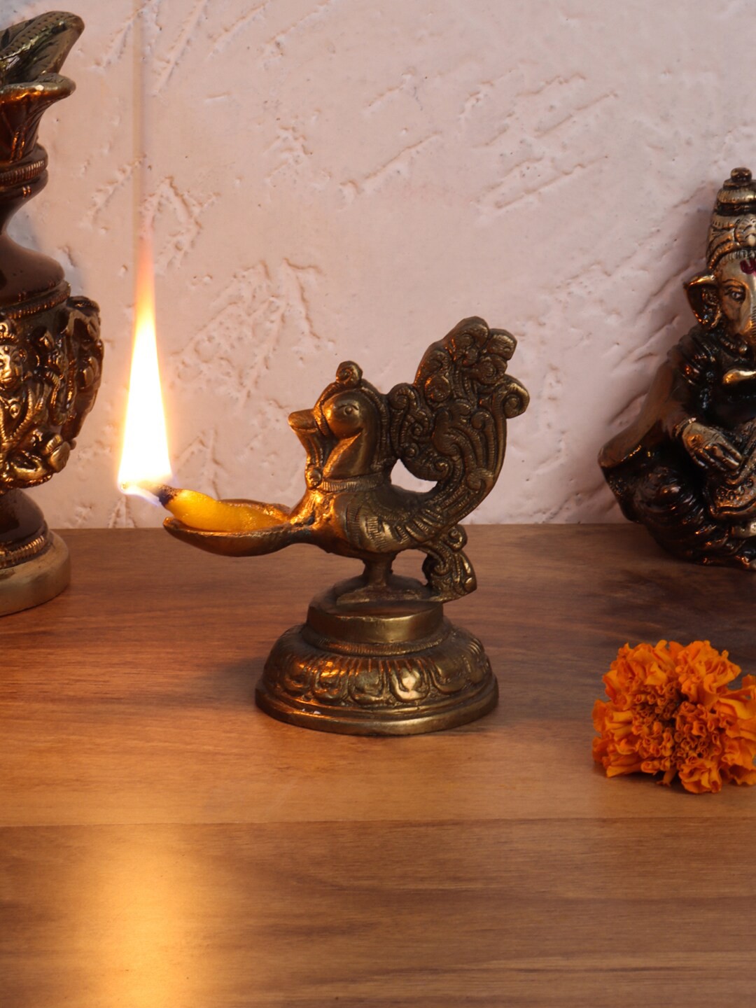

Aapno Rajasthan Brown Peacock Lamp With Round Base Pooja Essentials