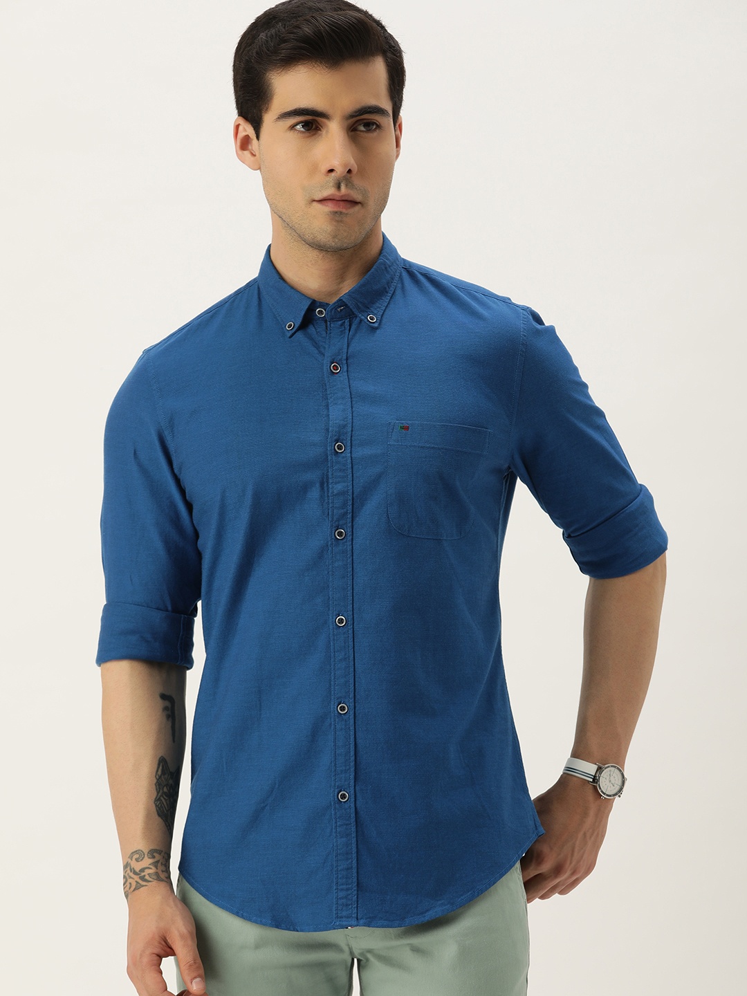 

Peter England Casuals Men Solid Button-Down Collar Slim Fit Casual Shirt, Blue