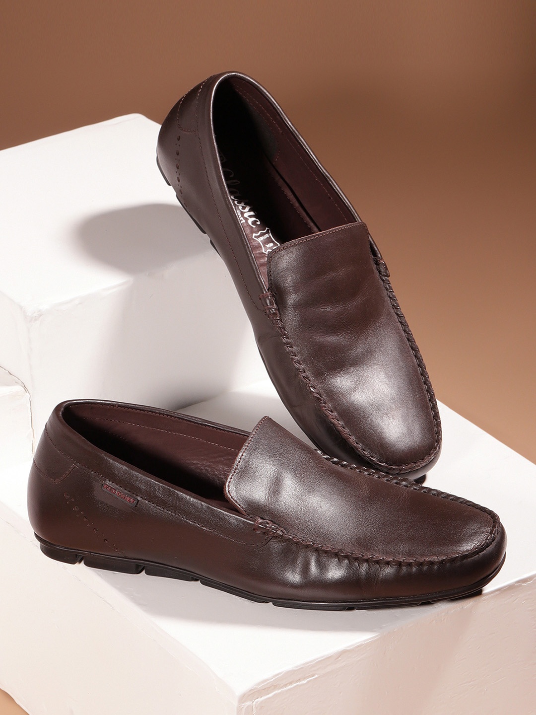 

Red Chief Men Brown Solid Leather Formal Loafers Shoes
