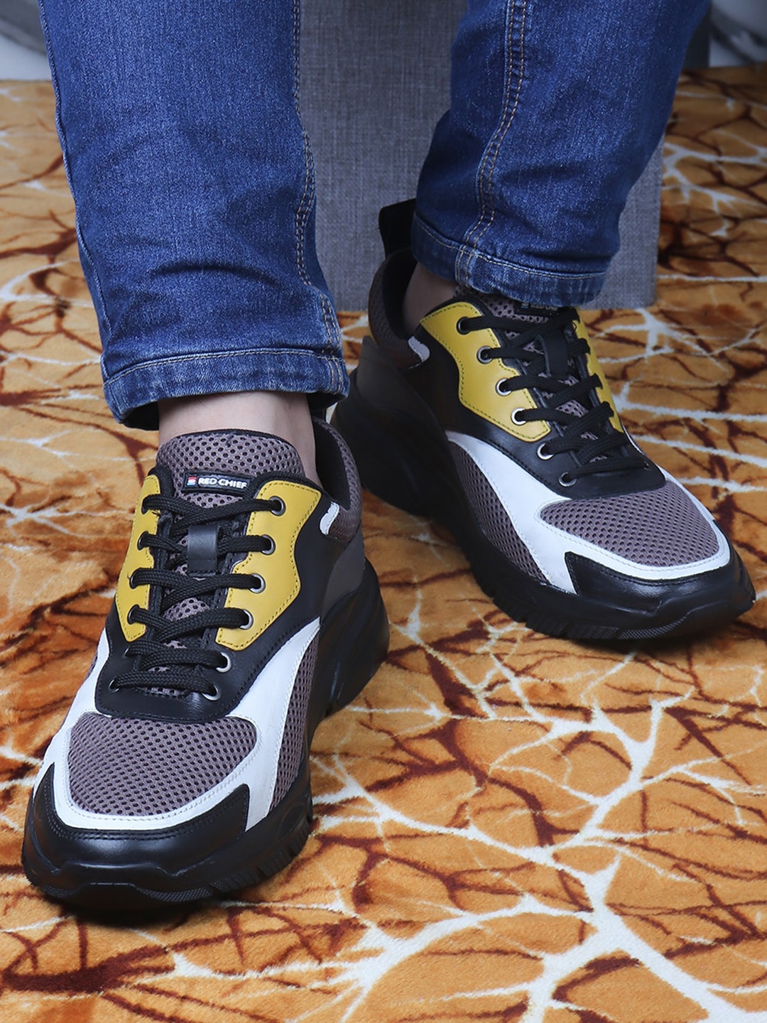 

Red Chief Men Black Colourblocked Leather Sneakers