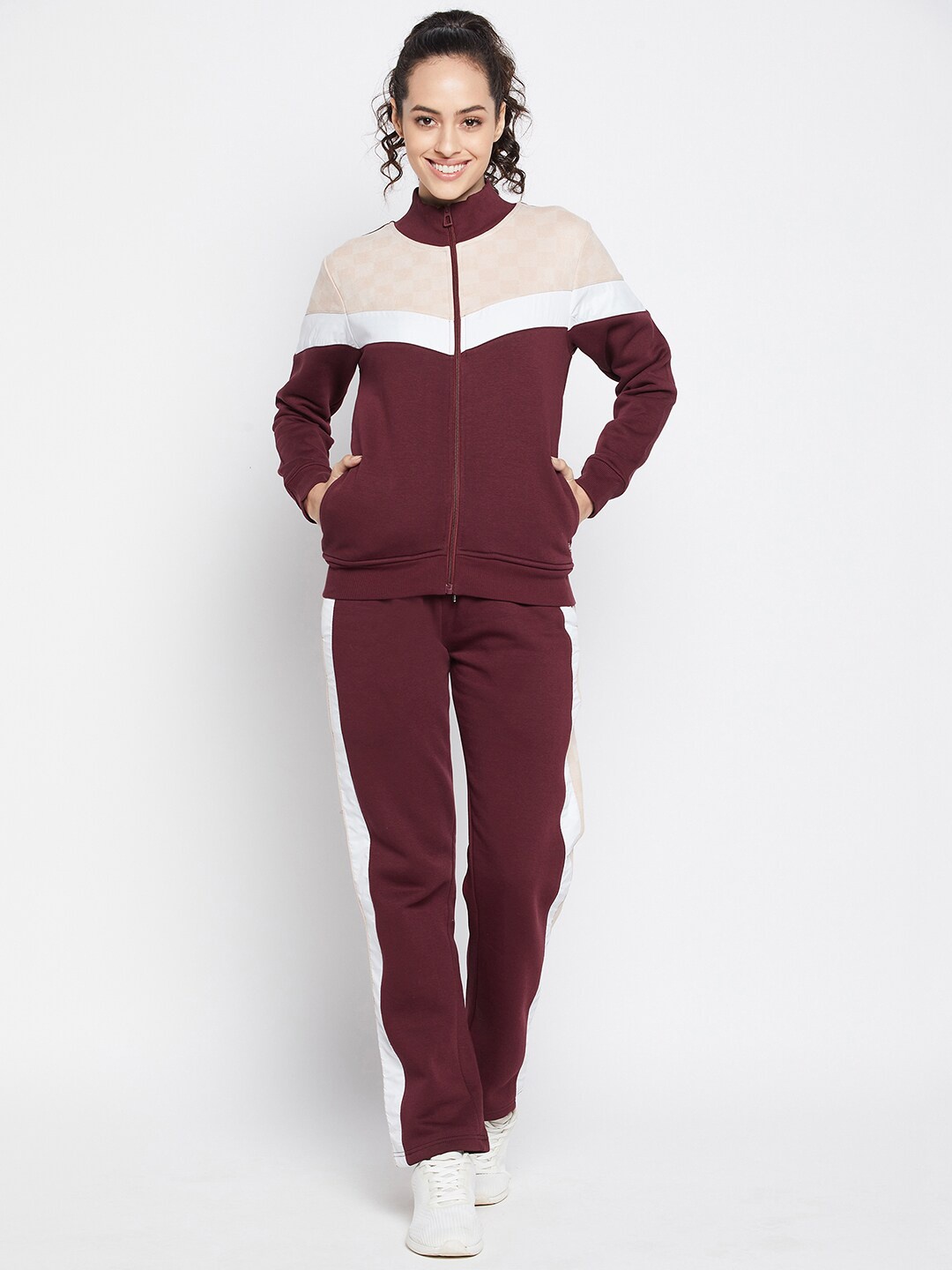 

Duke Women Maroon & Beige Colourblocked Tracksuits