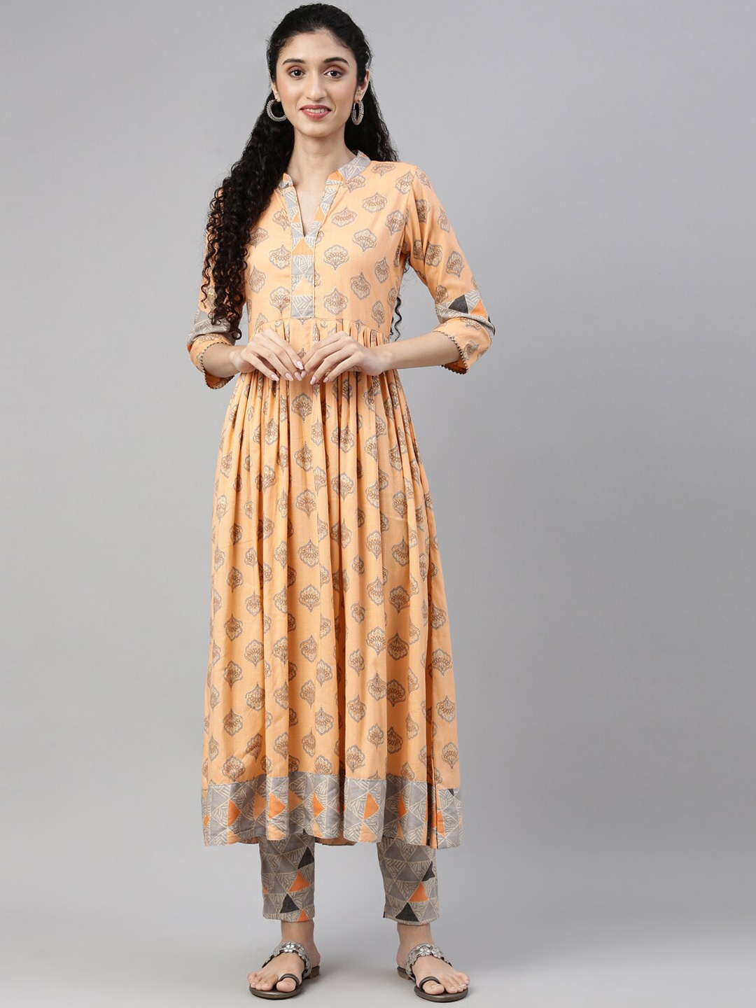 

NAYRA Women Orange Floral Printed Patchwork Kurta with Trousers