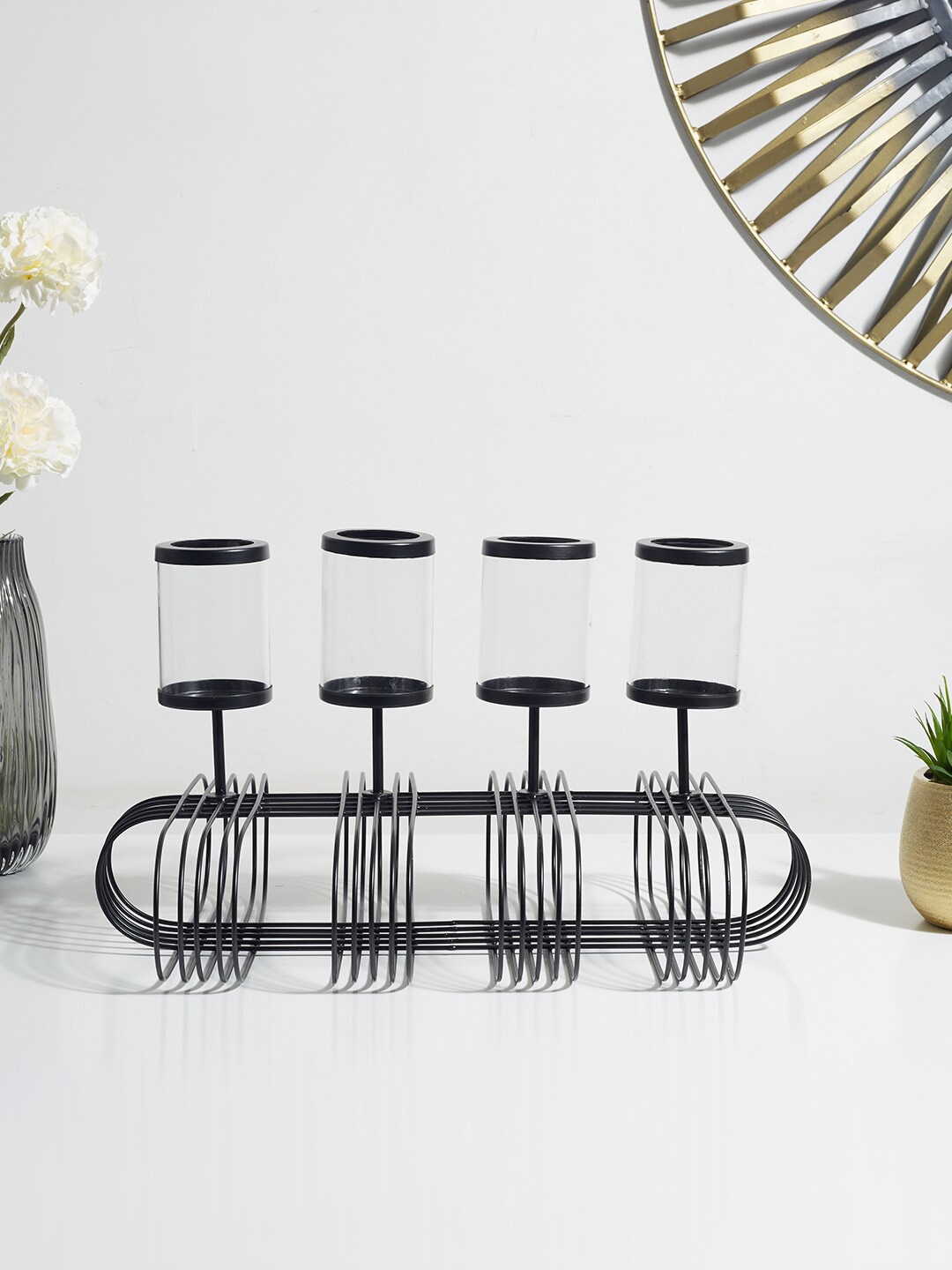 

HomeTown Black Solid Wired Four Slot Candle Holders