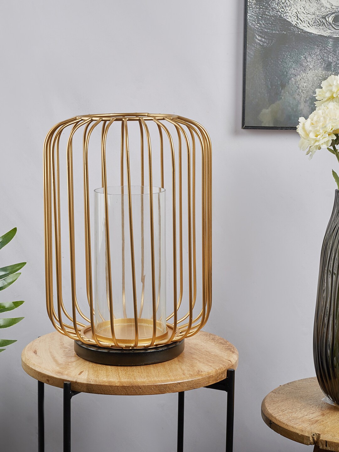 

HomeTown Gold-Toned Iron and Glass Wired Candle Holder