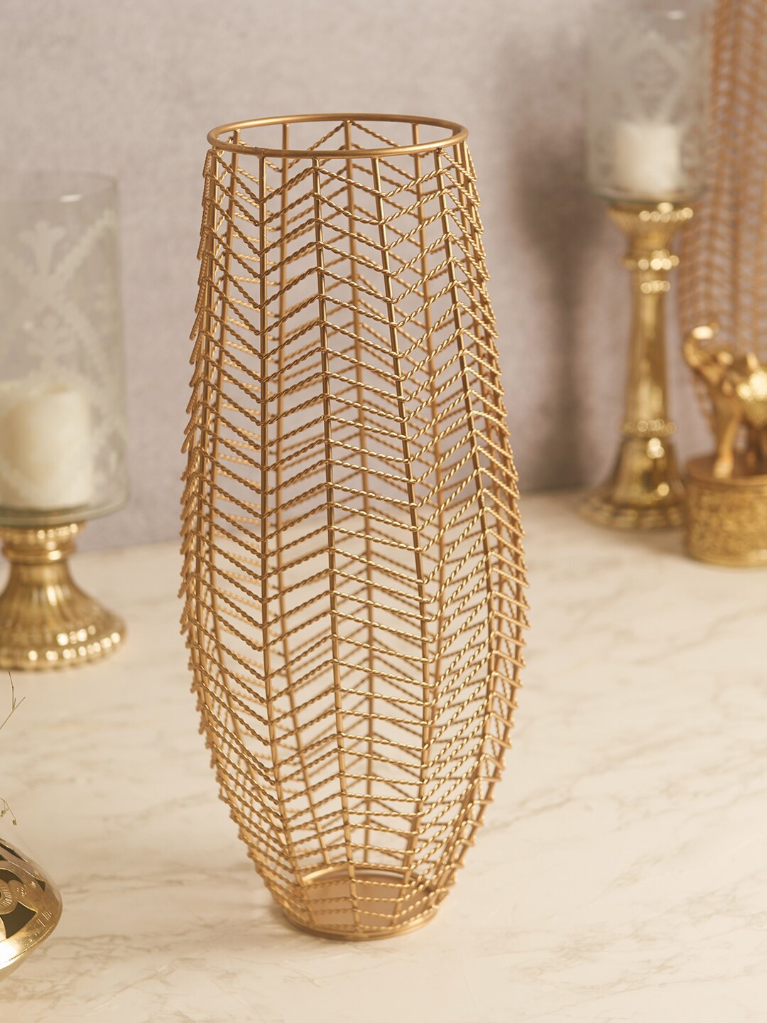

HomeTown Gold-Toned Metal Orient Textured Vase