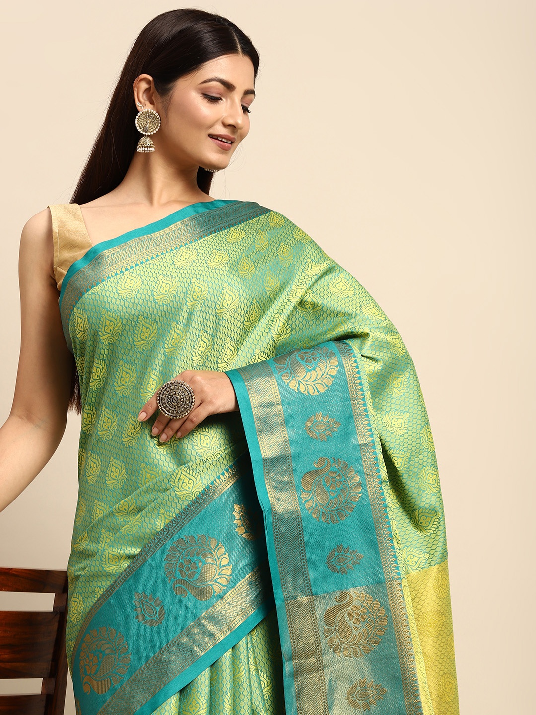 

Anouk Mustard & Green Ethnic Motifs Zari Silk Blend Banarasi Saree