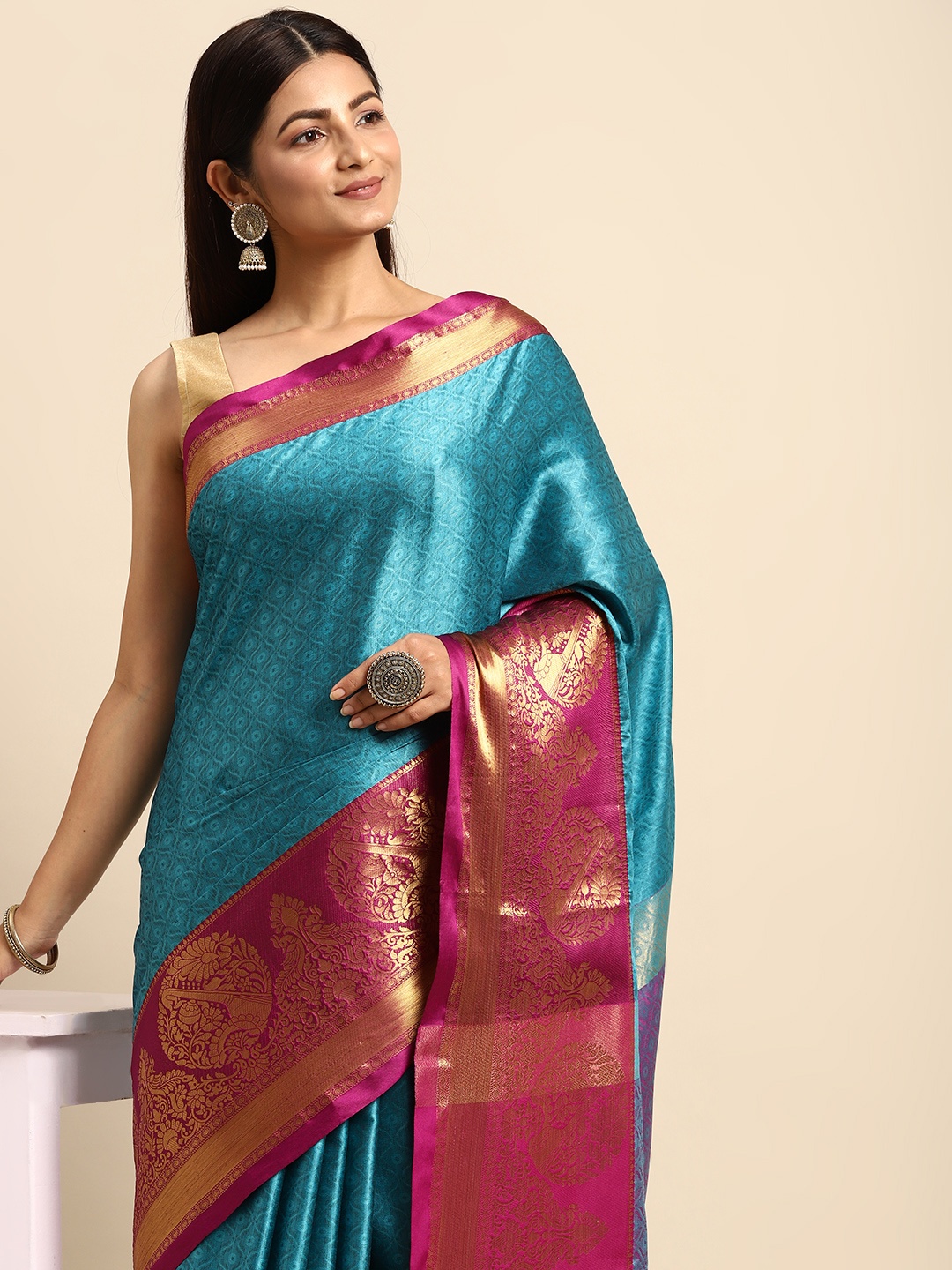 

Anouk Turquoise Blue & Pink Ethnic Motifs Zari Silk Blend Banarasi Saree