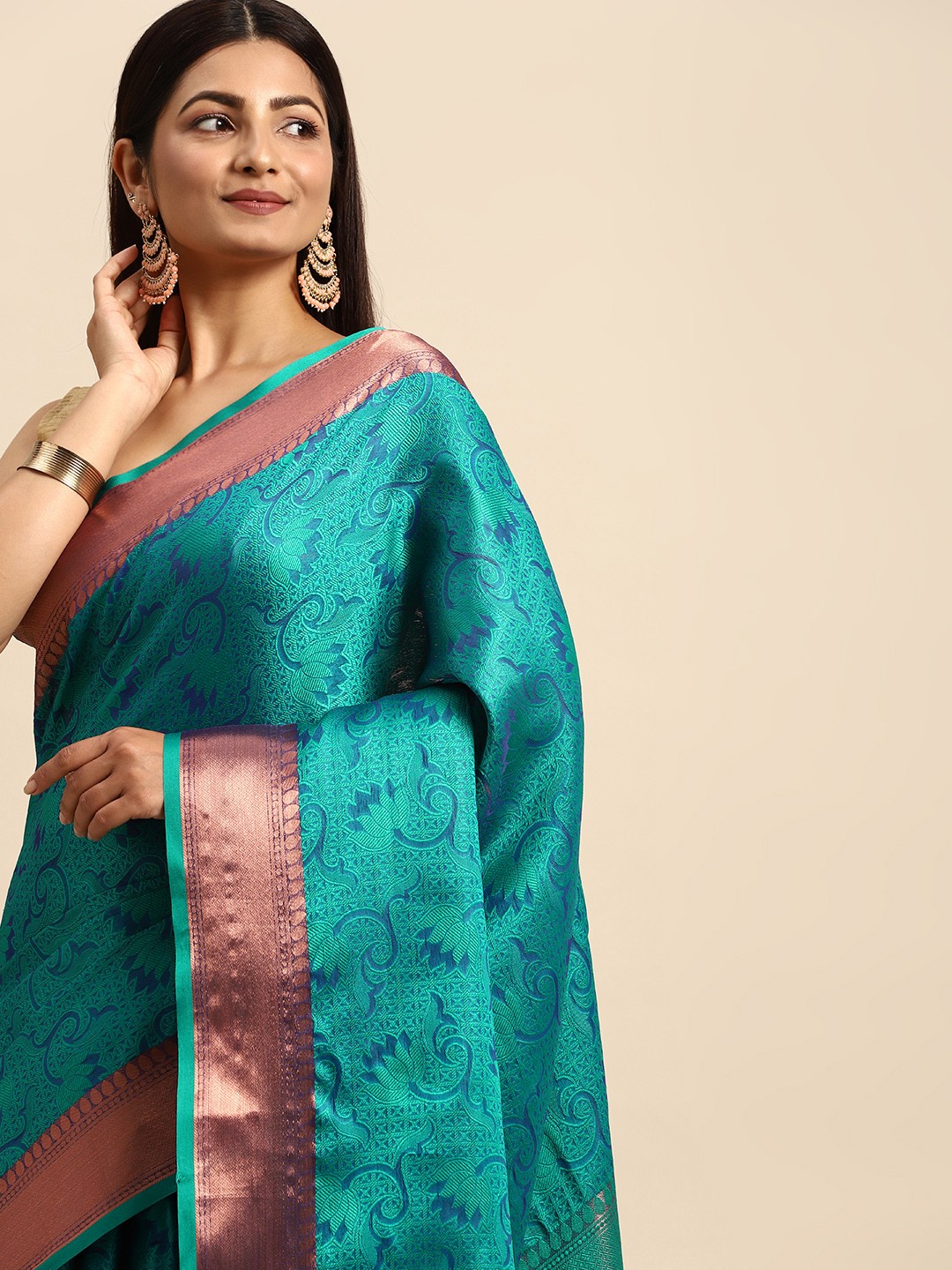 

Anouk Sea Green & Rose Gold Floral Zari Silk Blend Banarasi Saree