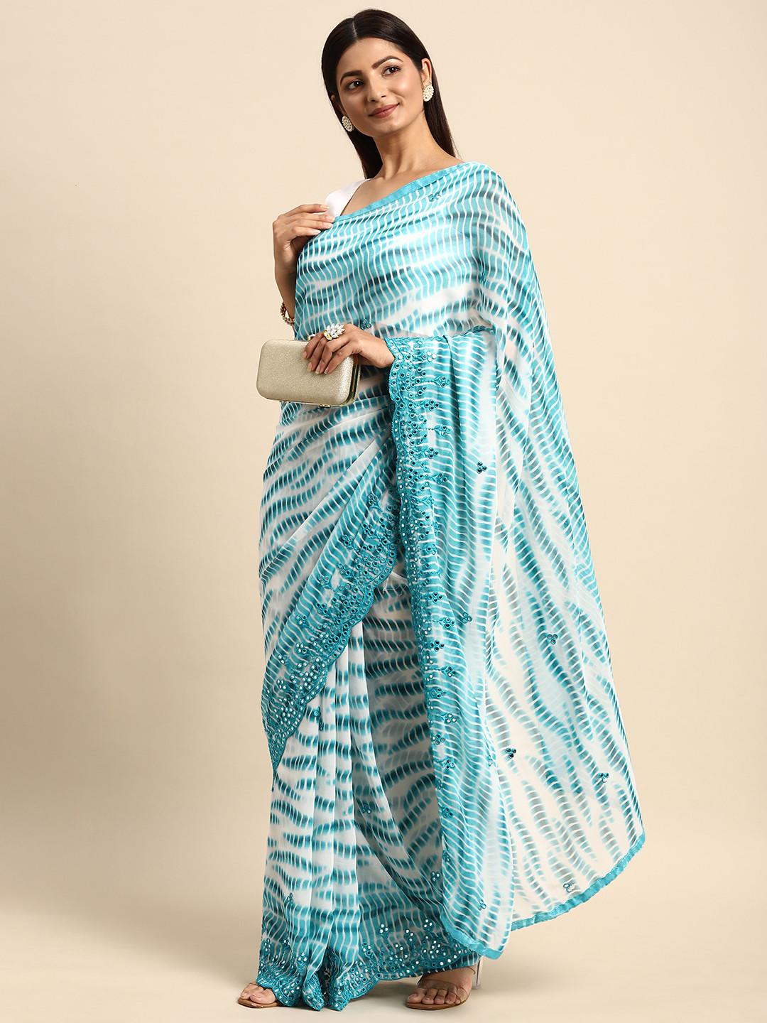 

Anouk White & Turquoise Blue Mirror Work Pure Georgette Saree