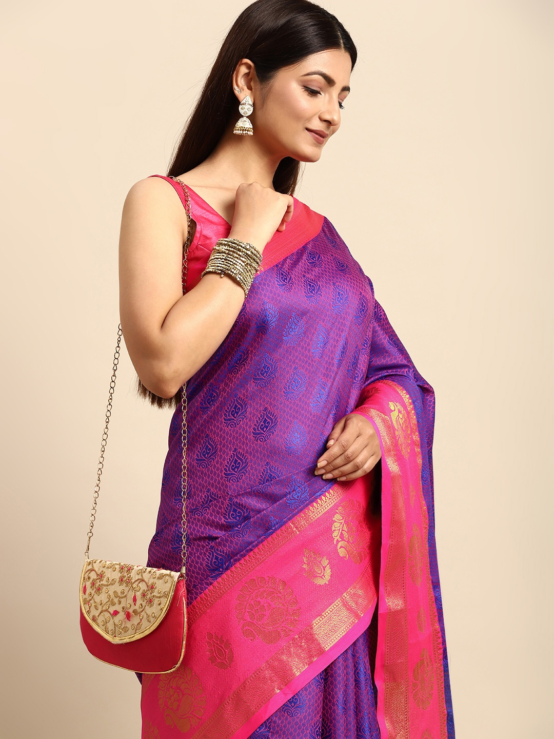 

Anouk Violet & Pink Ethnic Motifs Zari Silk Blend Banarasi Saree