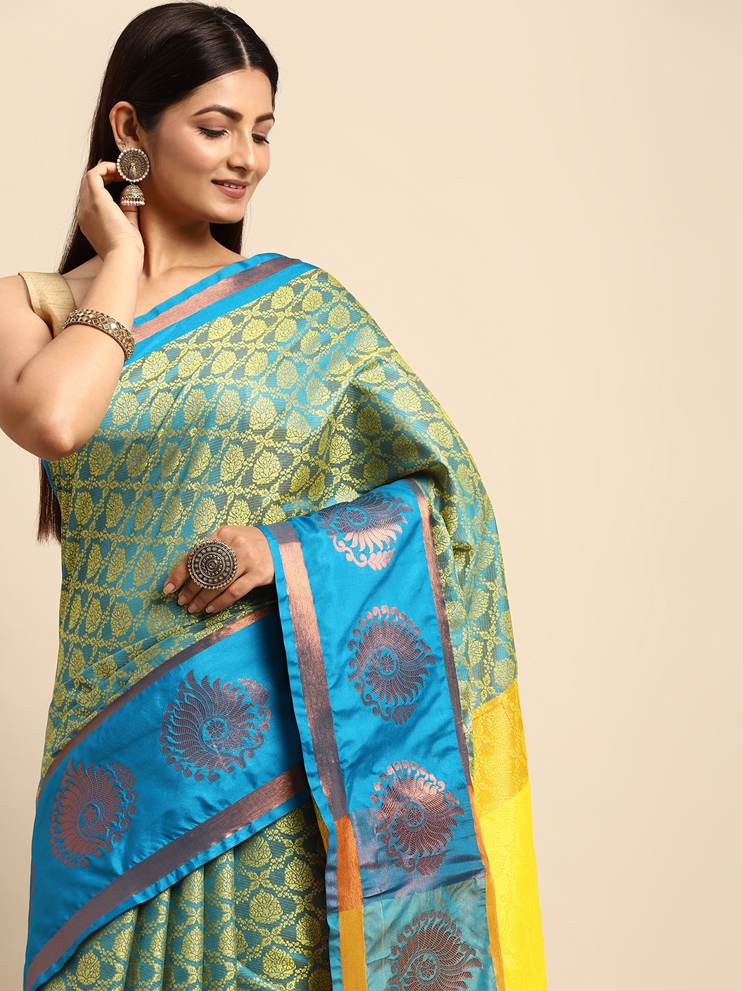 

Anouk Olive Green & Turquoise Blue Ethnic Motifs Zari Silk Blend Banarasi Saree