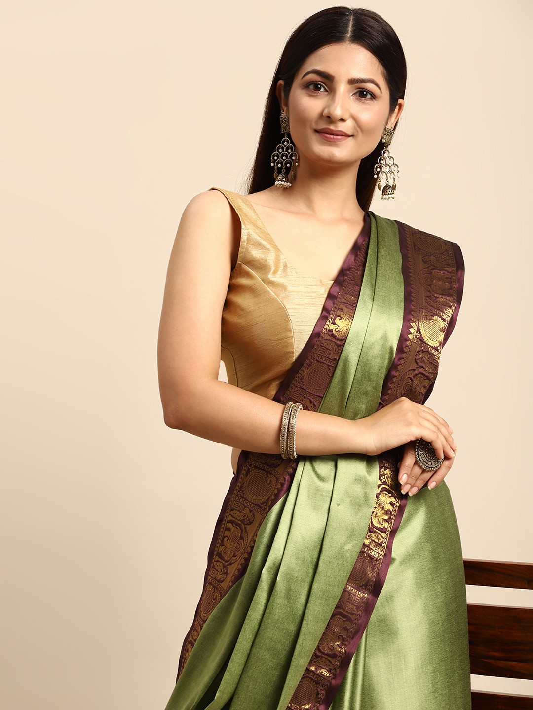 

Anouk Green & Maroon Zari Silk Blend Banarasi Saree