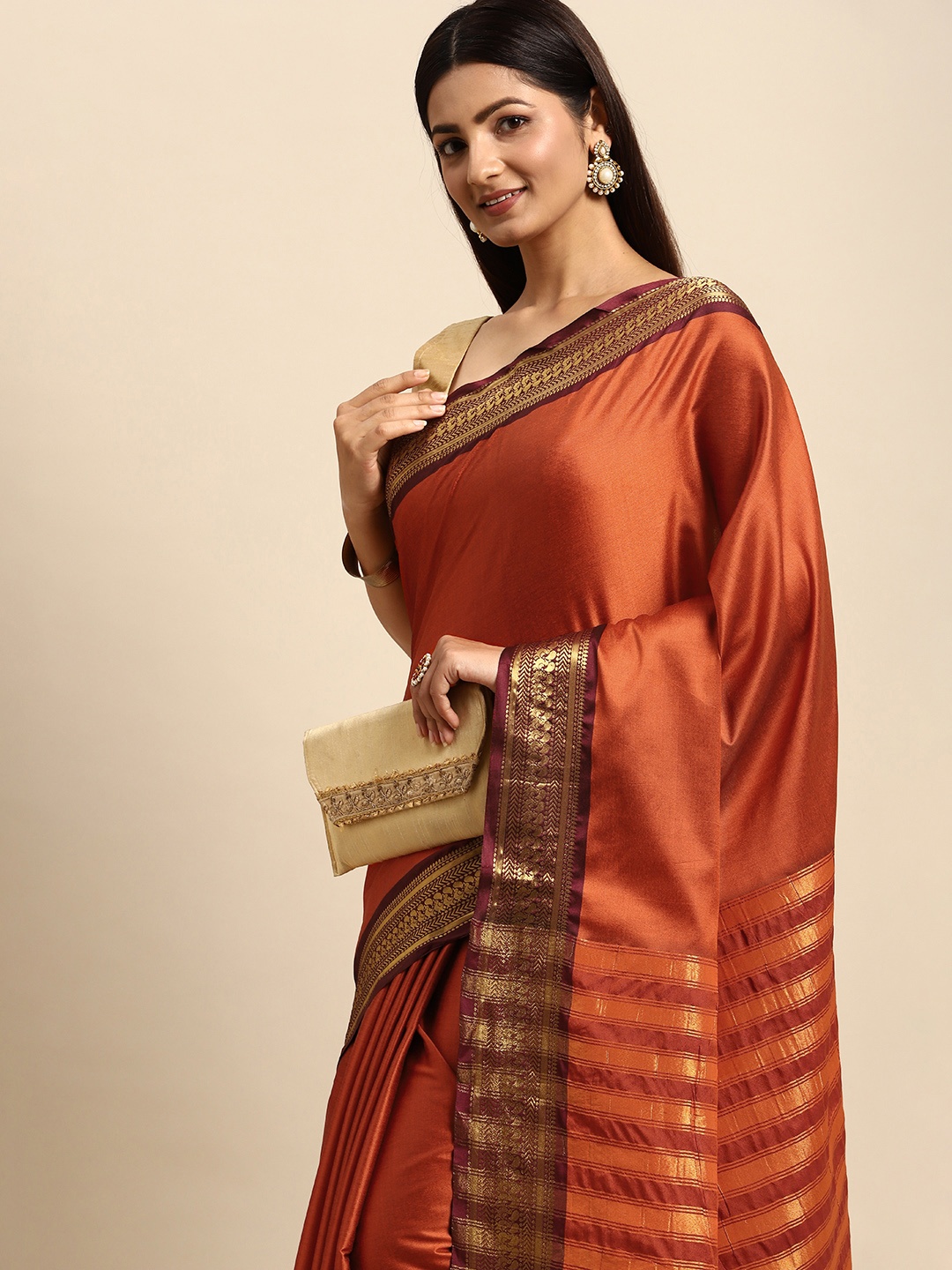 

Anouk Orange & Maroon Zari Silk Blend Banarasi Saree