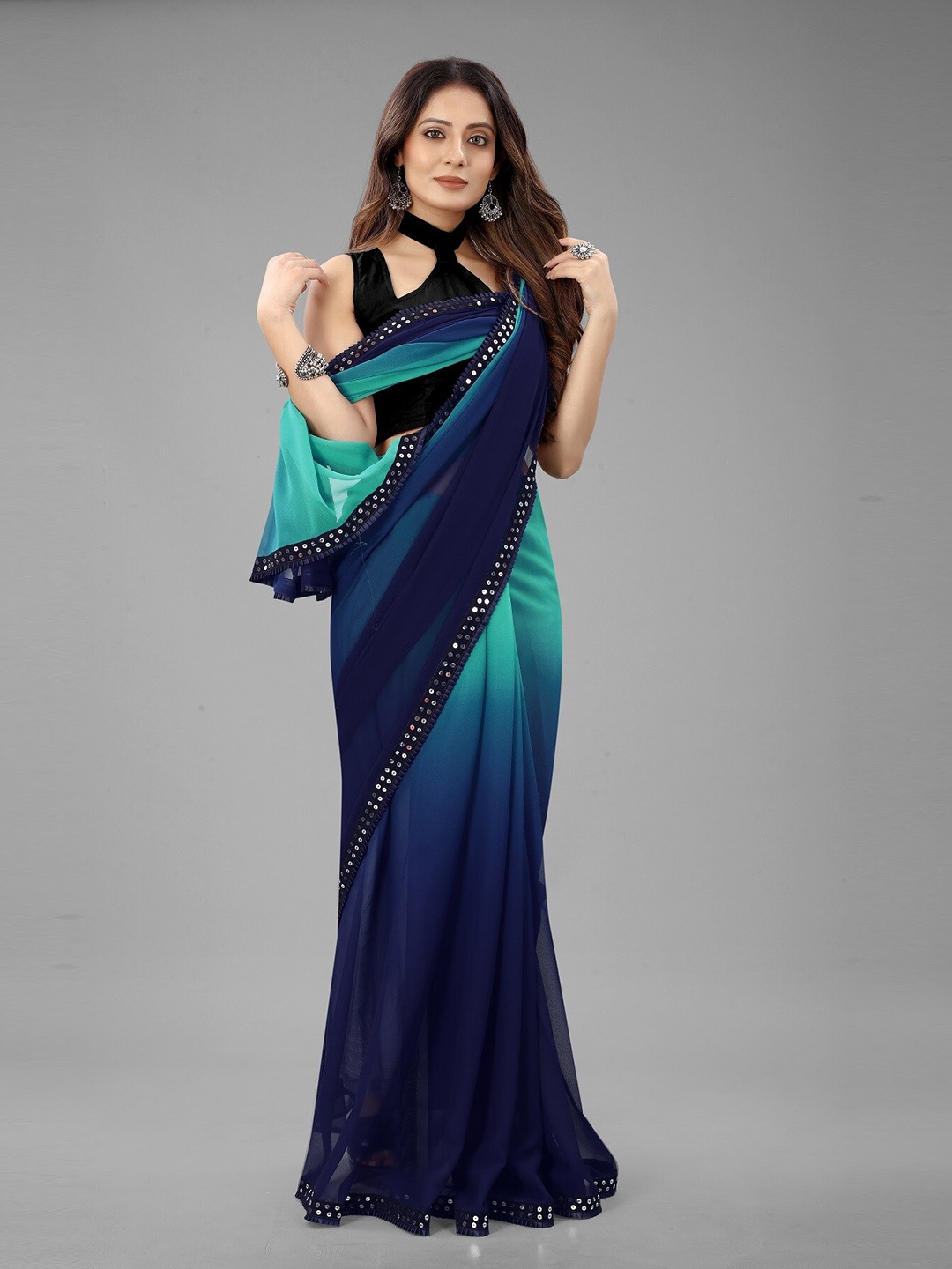 

M M Venture Turquoise Blue & Black Ombre Sequinned Pure Georgette Saree